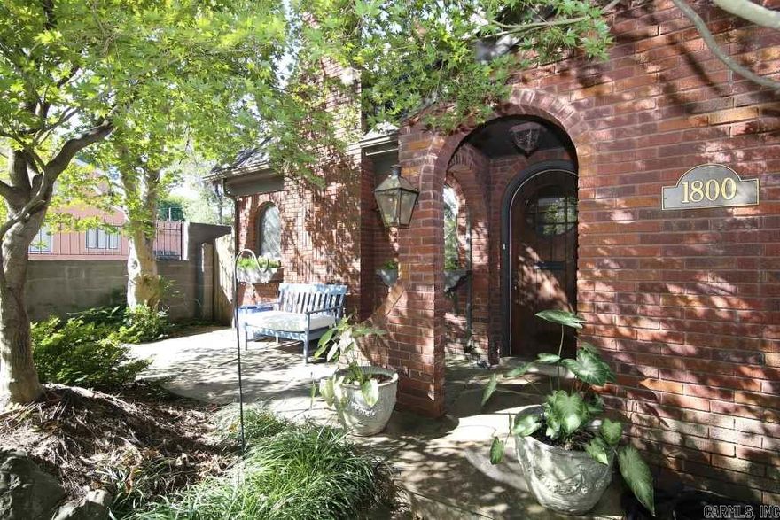 Wonderful updated brick home in the Heights!  Tons of Character from the arched windows to glass door knobs and hardwood floors to beautiful light fixtures.  Wall of windows in office.  Living room with fireplace.  Formal dining room with swing door into kitchen.  Stainless steel appliances.  Three bedrooms plus 2.5 baths plus upstairs bonus space.  Fully fenced back yard with covered side porch and detached 2 car garage.  Neutral decor.  Charm Galore!