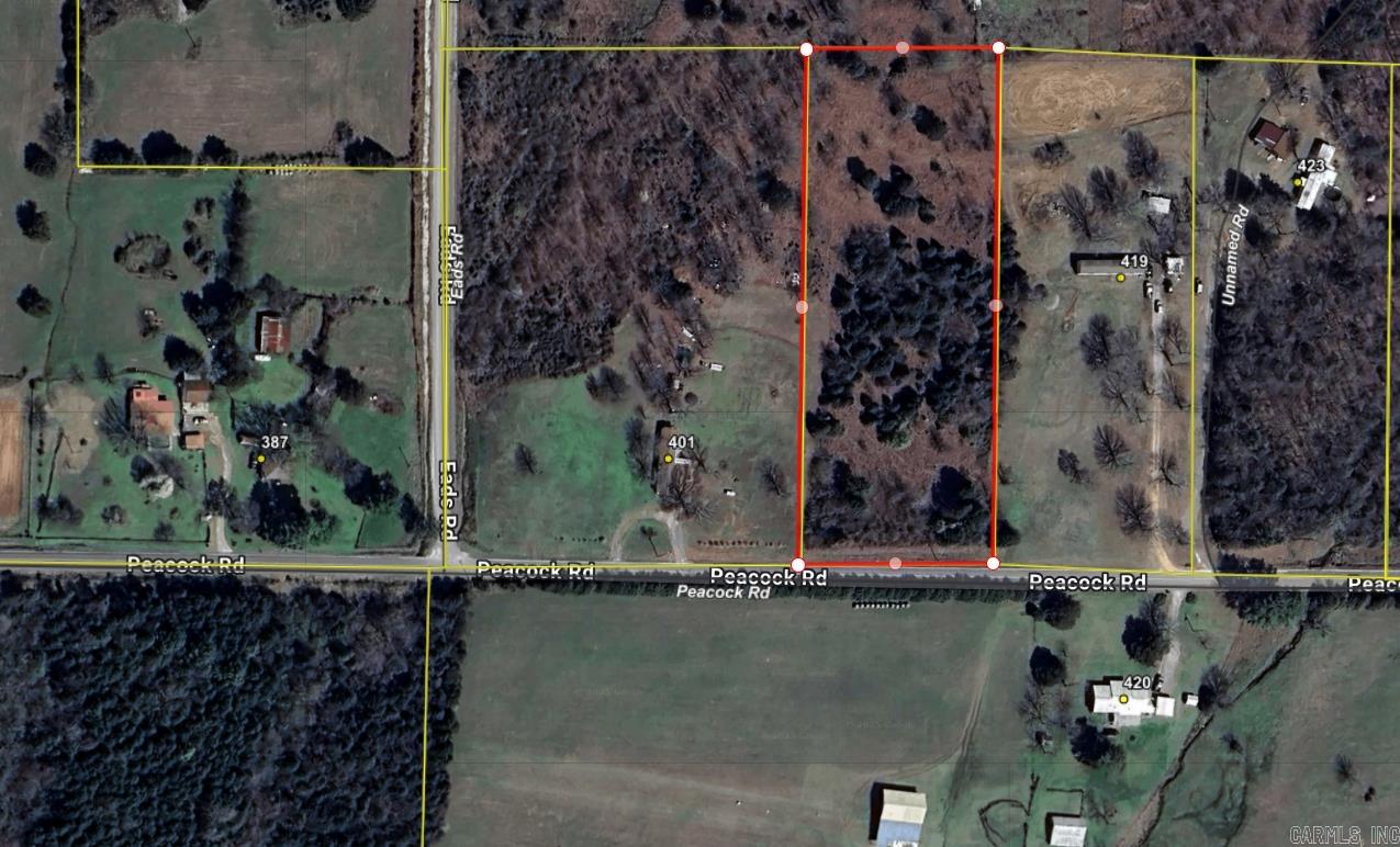 3.09 acres +/- of flat land for sale. Pastures have grown up some but there are some open spots to build or bring a home in. Paved road Utilities available No Restrictions Seller will finance this property