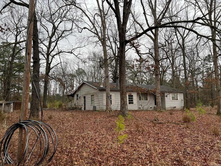 Fixer Upper House on 4.7 acres. Nice country setting Owner Will Finance this property