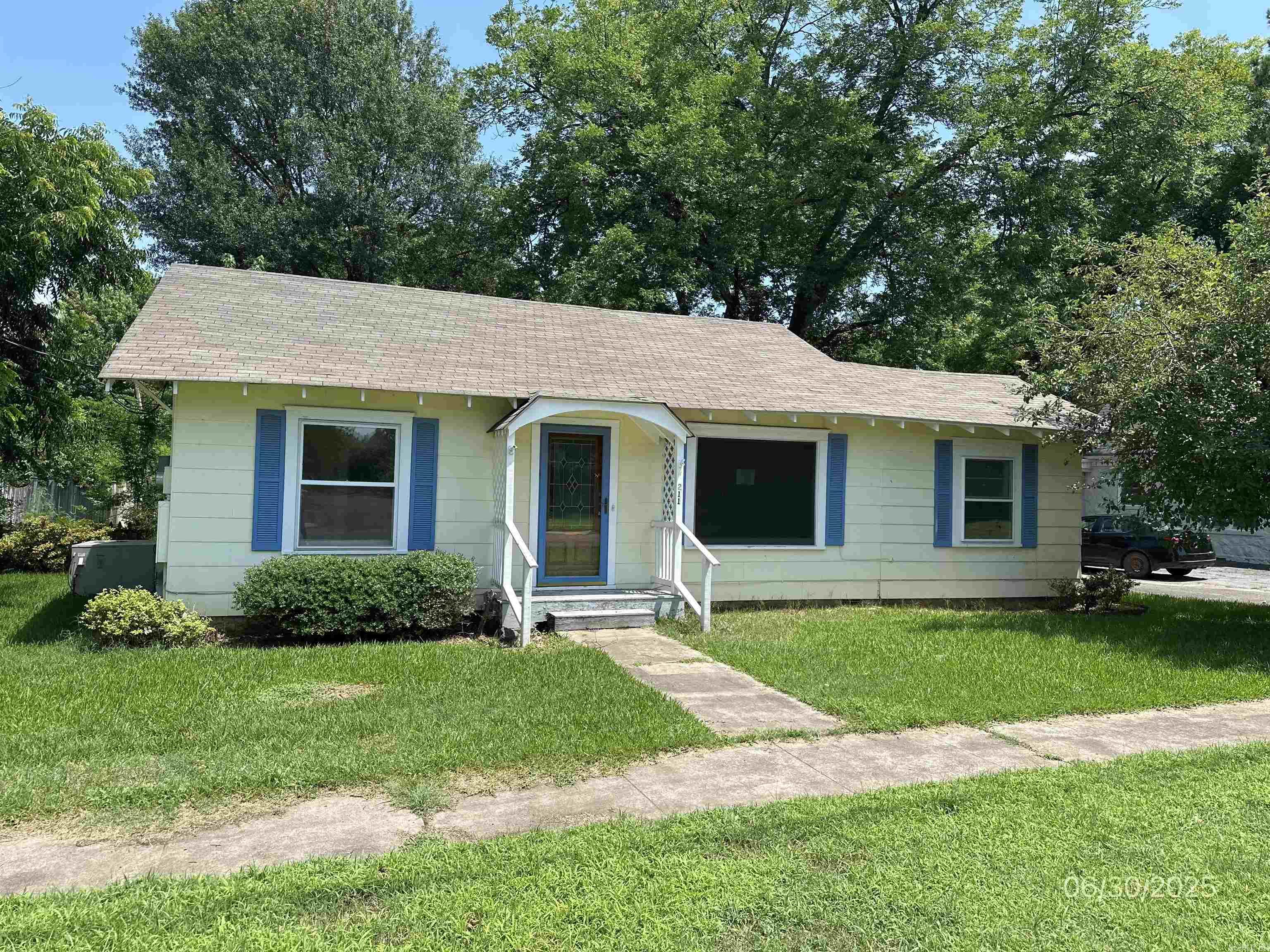 There is so much to love about this super cute historic home conveniently located close to Arkansas Tech University. This 3 bedroom and 2 full bath home features a large living room plus a cozy den (or it could easily be a 4th bedroom), dining room plus a separate breakfast area. The shade from the mature hardwood trees will allow you to enjoy the spacious back yard and patio area. year round. The original hardwood floors have beautifully been refinished. There is a detached garage and plenty of outside parking. This is a foreclosure and seller will not pay customary title police, escrow fees, survey or transfer fees. POF or Pre-Qual letter dated 30 days or less required with offer. All offers must be submitted at www.vrmproperties.com. Agents must register as a user, enter the property address, and click on start offer.