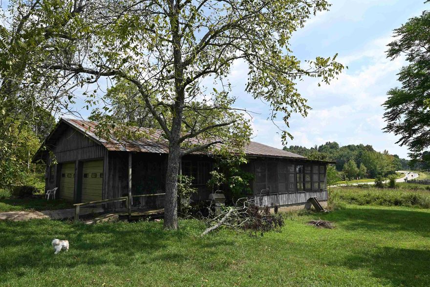 AN OLDER HOME SITS ON 6.33 ACRES OF LAND. PRIME REALESTATE FOR A NEW HOME. HAS WATER AND ELECTRIC ON PROPERTY. HWY FRONTAGE. LAND IS FLAT. GOOD GARDEN SPOT. THE HOME THAT IS THERE NOW WILL NEED SOME TLC.  2 CAR GARAGE OR FIX UP FOR MORE ROOMS IN THE HOME. NOT TO FAR TO THE BUFFALO RIVER AND THE NATIONAL FOREST. RUSSELLVILLE IS A NICE DRIVE FOR SHOPPING AND EATING. BEAUTIFUL COUNTRY, LOTS OF WILDWIFE AND THINGS TO DO IN THE AREA.  GOOD NEIGHBORS.