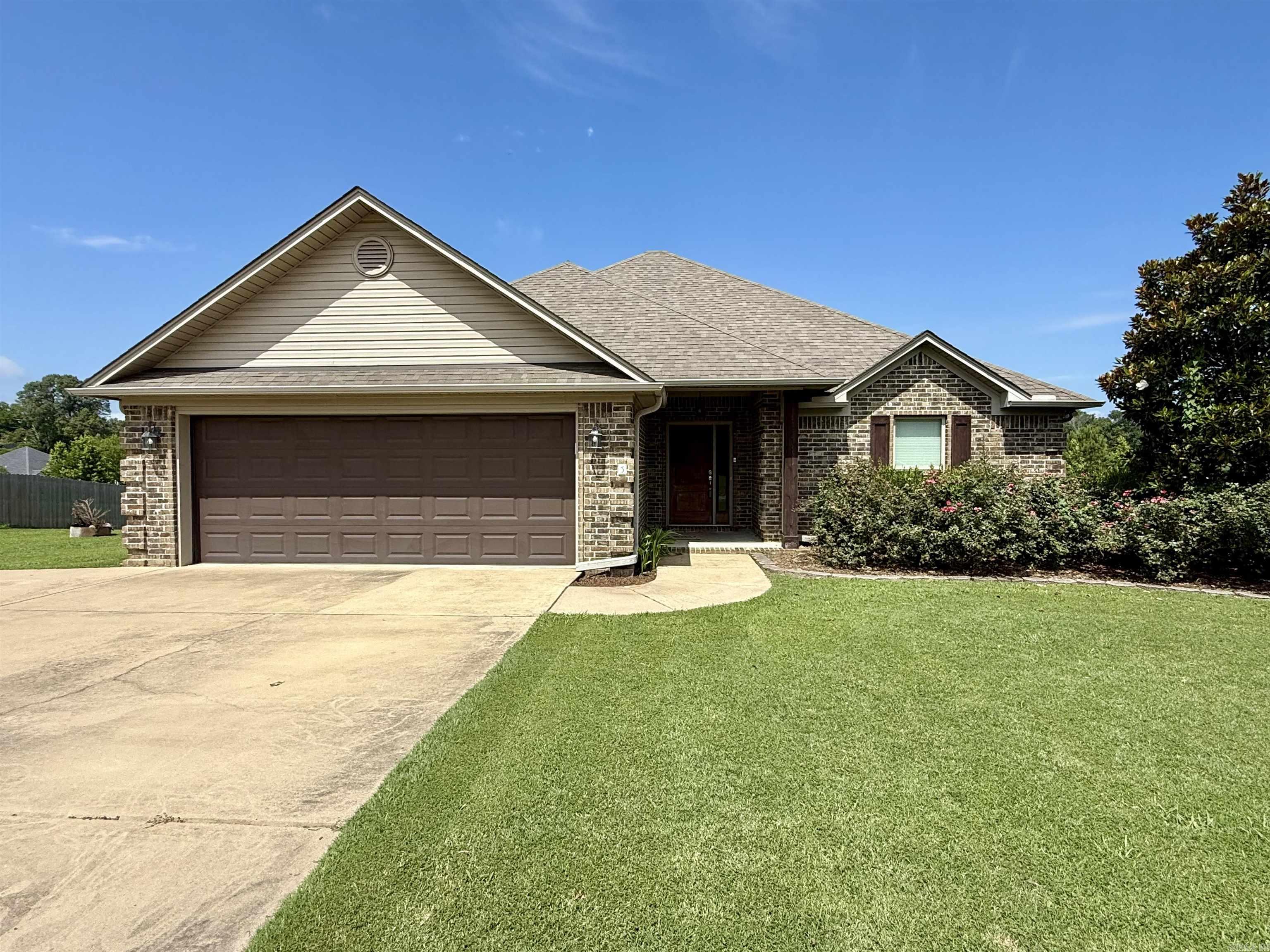 Well maintained 3 bed/2 bath home on .82 acres. Concrete floors throughout open floor plan. Kitchen features granite counters, stainless steel appliances, TWO pantries, and breakfast bar. Kitchen/dining/den are all open to each other making it a great house for entertaining. Living room is spacious features gas fireplace with stone surround. Primary bedroom is split and is highlighted with a tray ceiling, adjoining bathroom with jetted tub, walk in closet, long vanity w/ granite counters and walk in shower. Two guest rooms have great closet space as well. Large deck over looks backyard extends past actual fence line. Two car garage, gutters, great landscaping and nestled on a cul de sac road!