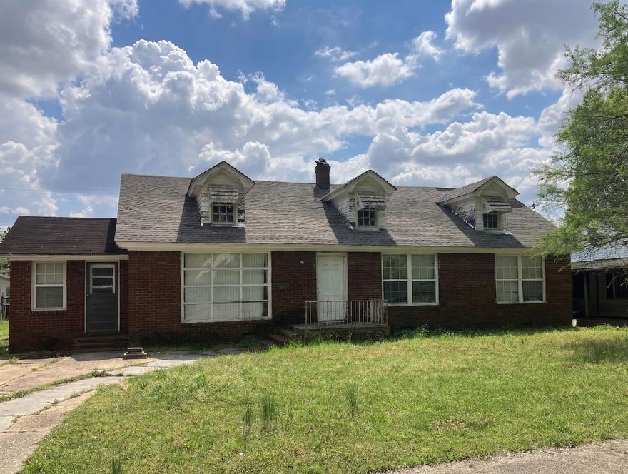 Perfect Investment Opportunity with Immediate Cash Flow! Ideally located in the heart of Blytheville, this expansive brick home offers over 2,200 sq. ft. of living space and is already a proven performer. This home was generating $1,000 per month in rental income, making this home a "turn-key" addition to any investment portfolio. The interior features a versatile and functional floor plan, including both a formal living room and a spacious den, providing plenty of room for family gatherings or entertaining. The home sits on a level lot with a large front concrete pad for ample parking. Additional conveniences include a laundry room and a classic brick exterior. Whether you are looking for a steady income producer or a large home with great bones to make your own, 1205 Walnut St is a must-see. Sold AS-IS.