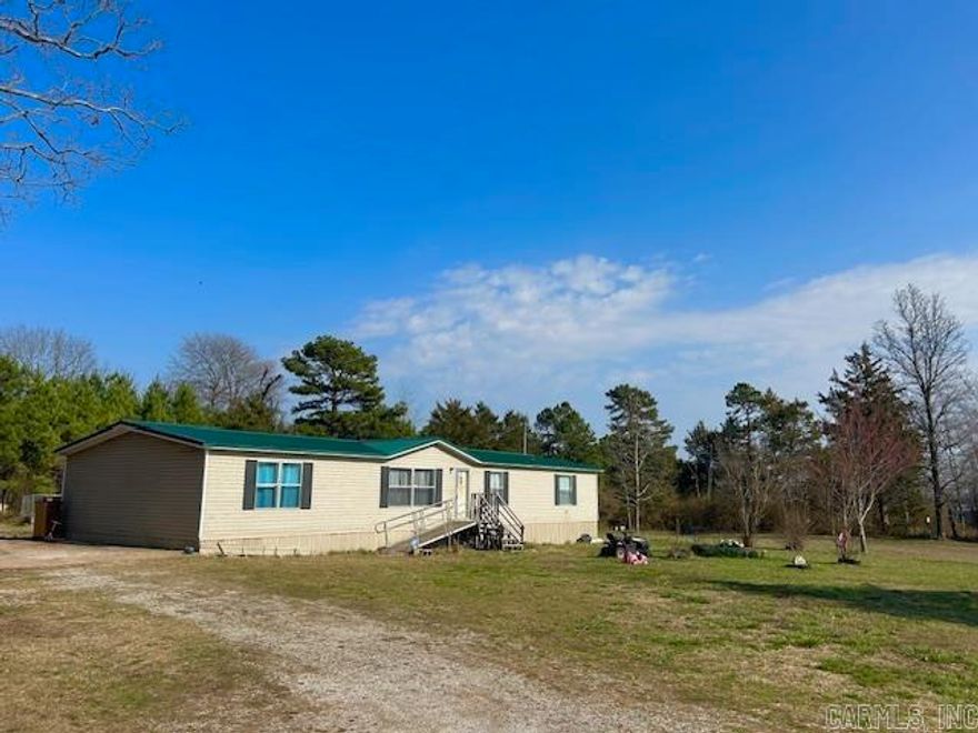 This 4 bedroom 2 bathroom 2016 Sq Ft. mobile home sits on one acre of land just across from the Fox Park. Within walking distance to the post office as well as Fox Country Store and only a few minutes to the school. Only about 30 minutes to the beautiful town of Mountain View. Less than two hours to Branson and Conway .This home has been well taken care of and has had some updates such as a new roof and new flooring. Great place and great area for a first time home buyer. There is a nice yard with a great garden spot. No restrictions allowing someone to have chickens and or whatever you want. Lots of possibilities here. Call today to schedule a showing.