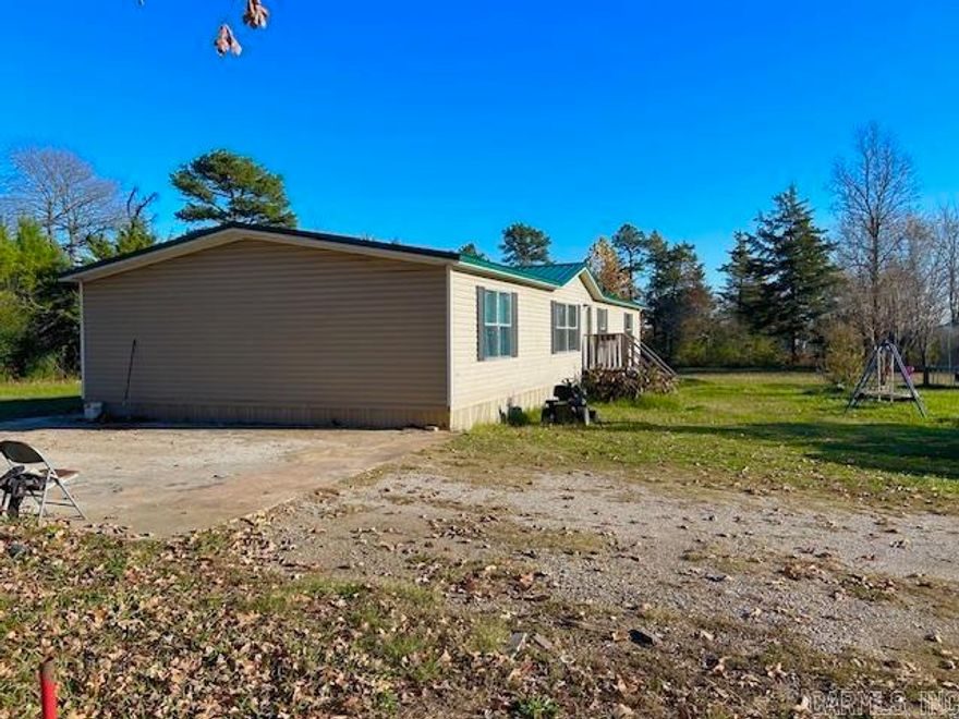 This 4 bedroom 2 bathroom 2016 Sq Ft. mobile home sits on one acre of land just across from the Fox Park. Within walking distance to the post office as well as Fox Country Store and only a few minutes to the school. Only about 30 minutes to the beautiful town of Mountain View. Less than two hours to Branson and Conway .This home has been well taken care of and has had some updates such as a new roof and new flooring. Great place and great area for a first time home buyer. There is a nice yard with a great garden spot. No restrictions allowing someone to have chickens and or whatever you want. Lots of possibilities here. Call today to schedule a showing.