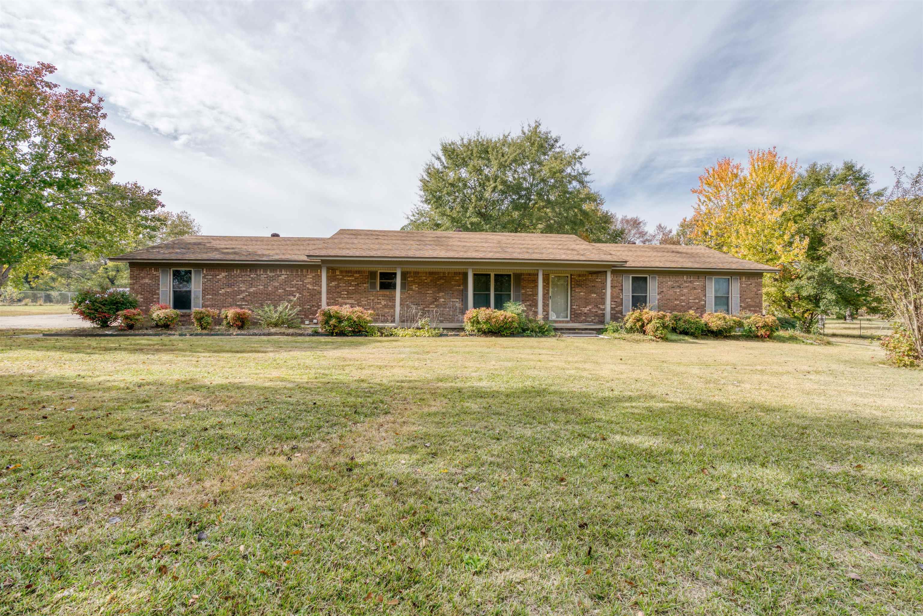 Talk about WOW! 12 ACRES! Fully fenced! ELECTRIC GATE ENTRY! This property is STUNNING! COULD GO COMMERCIAL! This 3 bed, 2 bath home is lovely. 2 HW Heaters, Fridge Stays! 20KW GENERATOR from 2018 serviced yearly. 40x75 3 BAY SHOP, 24x36 2 BAY SHOP, HUGE DOUBLE DOOR TIN SHED! Storage GALORE! House is fully fenced around with shops! The rest of the property fenced as well. POND! LOCATION LOCATION LOCATION! Convenient to everything!  Come see it today! Sq ft Approx. Please measure. SEE AGENT REMARKS!!!!!!!