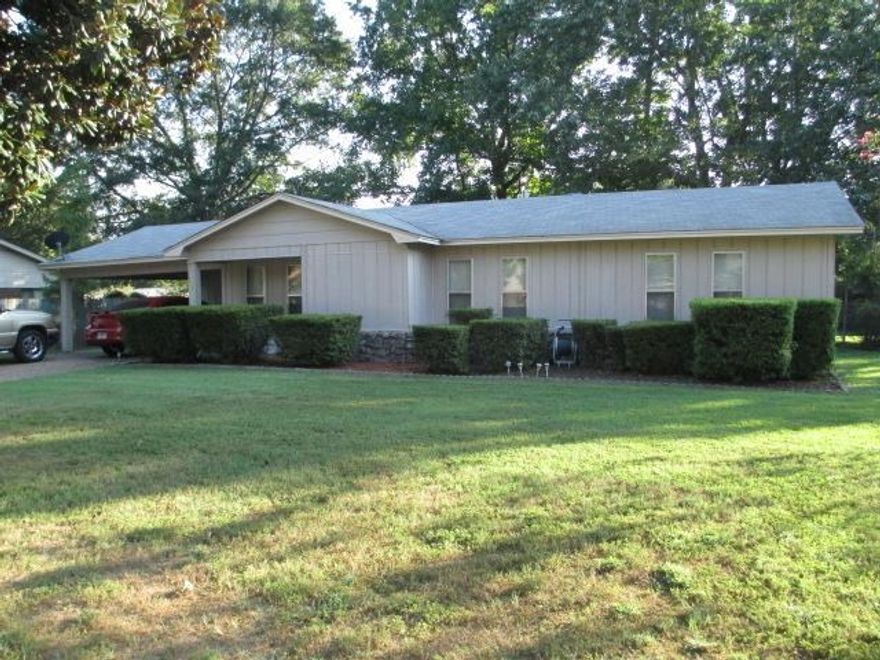 Great space buy! This property has 3 large bedrooms or 2 bedrooms and an office, large living room, great kitchen, 2 full baths and a 35 X 16 sunroom. The property is located in a great peaceful subdivision close the restaurants and shopping areas.  The extra large backyard has an outbuilding and is completely fenced.  This is a must see!