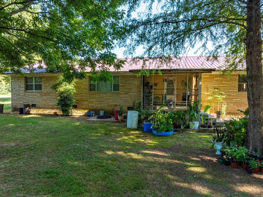 Private 3 bed, 2 bath home sitting on 10 secluded acres in Batesville, AR. This 2,300± sq ft home offers a spacious layout with a sun porch entry, large living room, open dining and kitchen, and a flexible bonus area that could be a game room, in-law suite, or additional bedrooms. Split floor plan includes 3 bedrooms and 2 full baths. The laundry area is oversized and could be finished into a 4th bedroom. Home is move-in ready with minor updates needed.  Property includes a second older mobile home (needs work) and features a mix of pasture and wooded land—perfect for a hobby farm or recreational use. Pasture located at both the front and back of the property. County water (Town of Magness) and Entergy electric. Peaceful, private setting just minutes from town.