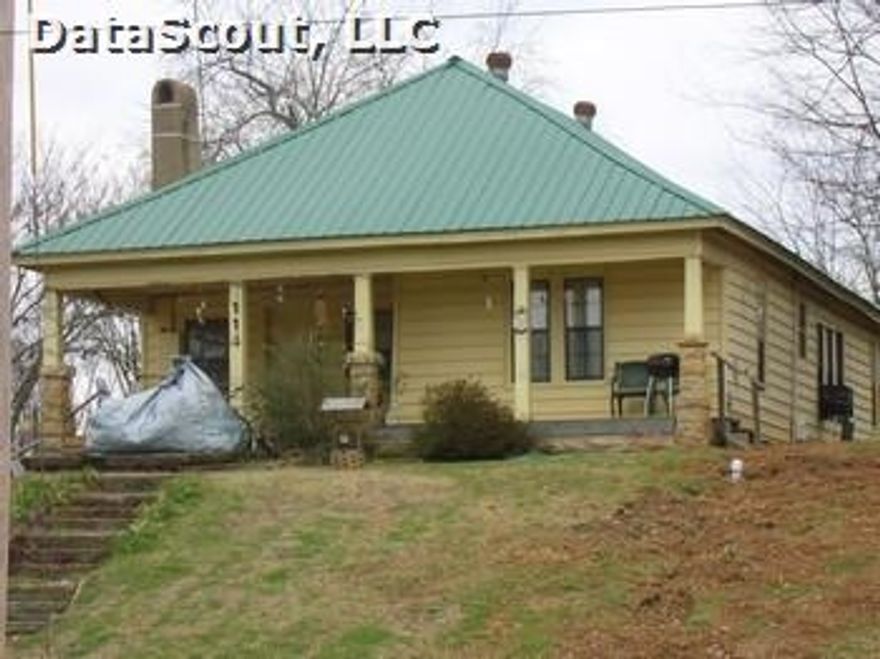 Original house was converted into a duplex with 1 bedroom, 1 bath and kitchen in the front, and 2 bedrooms, 1 bath and kitchen in the back. See Agent Remarks