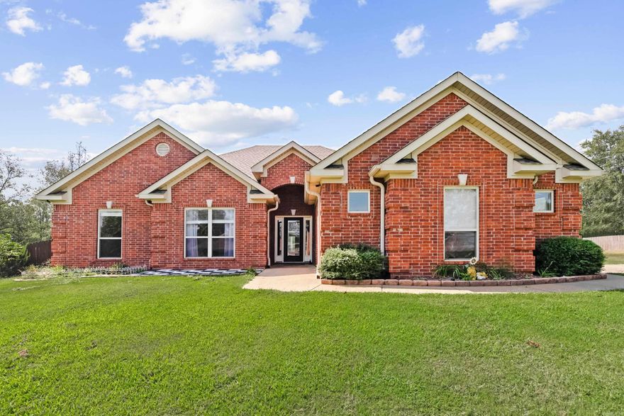 Stunning well maintained brick home on a large corner lot with open floor plan in a very desirable small subdivision conveniently located five minutes from I30. Fully fenced back yard with storm shelter, sauna, screened rear porch, three walk in closets, camera system, shop, out buildings, and so much more! New roof, HVAC, propane/wood fireplace and updated appliances that can convey. 30 minutes from LR or Hot Springs. No HOA fees. Come see it and it'll feel like home!