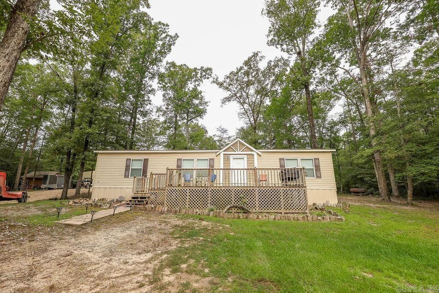 Looking for complete privacy...check out this home in the Urbana community.  Sits on 2.5 acres with a 35x42 shop featuring roll up doors and 2-bay heaters.  Enjoy the scenic surroundings from your front porch or entertain on your back deck!!