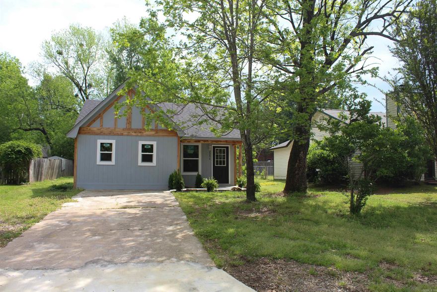 Step into modern luxury with this completely remodeled 4-bedroom, 2-bath home featuring brand-new everything; roof, HVAC, water heater, flooring, and more! The open-concept layout showcases sleek glass showers, a spacious walk-in closet, and a beautifully updated kitchen with all-new stainless steel appliances. With an accepted offer, all appliances including the stove, microwave, dishwasher, refrigerator, washer, and dryer are included. What more could you ask for? This stylish home is move-in ready and designed for both comfort and convenience. Ideally located near Russellville High School, downtown, and major restaurants and shopping centers. Book your showing today, this one won’t last!