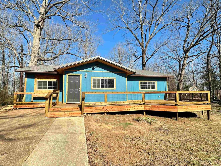 Updated Home in Cherokee Village is move in ready and ready for new owners! If you love the lakes and the rivers and the peaceful easy feeling that comes with the Spring River Area and Cherokee Village, take a look at this well laid out 1,114 sq ft home.  The split 3 bed, 1.5 bath and open floor plan is well lit and laid out providing plenty of space and privacy both indoors and out.  Recent updates include new flooring, fixtures, decking, and new mini splits.  Take a look at this bungalow and get ready for some summer fun!  Cherokee Village offers 7 lakes, rivers, parks, and hiking trails, 2 golf courses, and more! All of this is accomplished in a beautiful, natural, slow paced, small town sort of way.  Ask about how Rural Development could make home ownership possible even for those who did not think it so. Whether starting out, starting over, or starting an investment portfolio give us a call. This could be your new beginning!