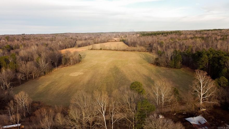 This 45 +/- acre property in Greene County near Paragould offers the perfect setting for your dream home with a beautiful mix of open pasture and mature timber. Approximately 15.5 acres are in highly productive Bermuda pasture, ideal for hay production or grazing, while the remaining 29.5 acres of timber provide excellent wildlife habitat with deer and turkey frequently seen on the property. Adding to its charm, Poplar Creek winds through the land for roughly 1,500 feet, creating a peaceful natural feature.  With approximately 1,800 feet of road frontage, this tract offers easy access and multiple potential building sites. Electric and fiber internet are already available on the property, making rural living convenient and connected. Located just 10 miles from Paragould and 15 miles from Jonesboro, you’ll enjoy quiet country living while staying close to everyday amenities.