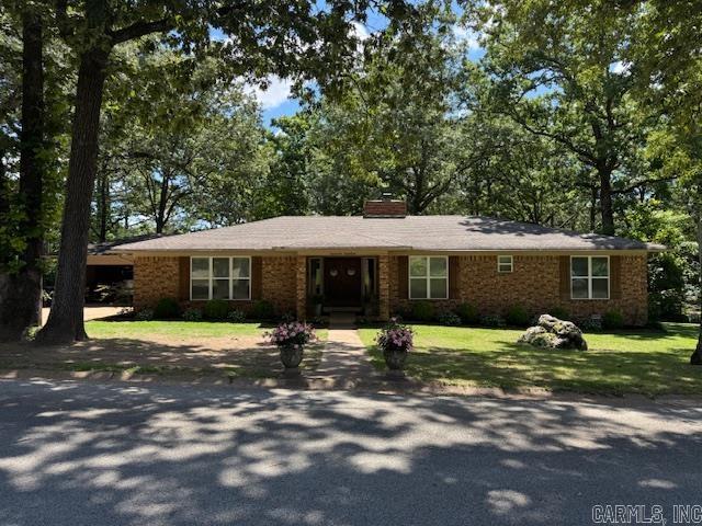 GORGEOUS 4BR, 2BA BRICK HOME!! Remodeled brick home has 2265 square feet plus a 483 square foot garage! Home has 4 bedrooms, 2 bathrooms, formal dining room or game room, living room-kitchen-dining combo and a large laundry room with pantry and room for a stand up freezer or extra refrigerator. Kitchen has a single basin sink, stainless appliances, bar with metal bar chairs and a breakfast area. Living room has brick fireplace that can be wood or gas but is currently using wood. Master suite with walk in closet and private bathroom. Home was remodeled in 2018. Other updates include new C/H/A in 2021, new roof in 2015, new windows in 2023, new water heater in 2023 and new deck in 2020. Features include double front door, brick accents, storm door, oversized 2 car garage with shelving, subway tile, granite vanity, can lighting, pocket doors, tons of storage and tile showers. Sitting on .36 of an acre with a great new deck overlooking the spacious back yard, on a nice street within walking distance to schools! Not many of these available in the well established, beautiful Bowlin Addition.