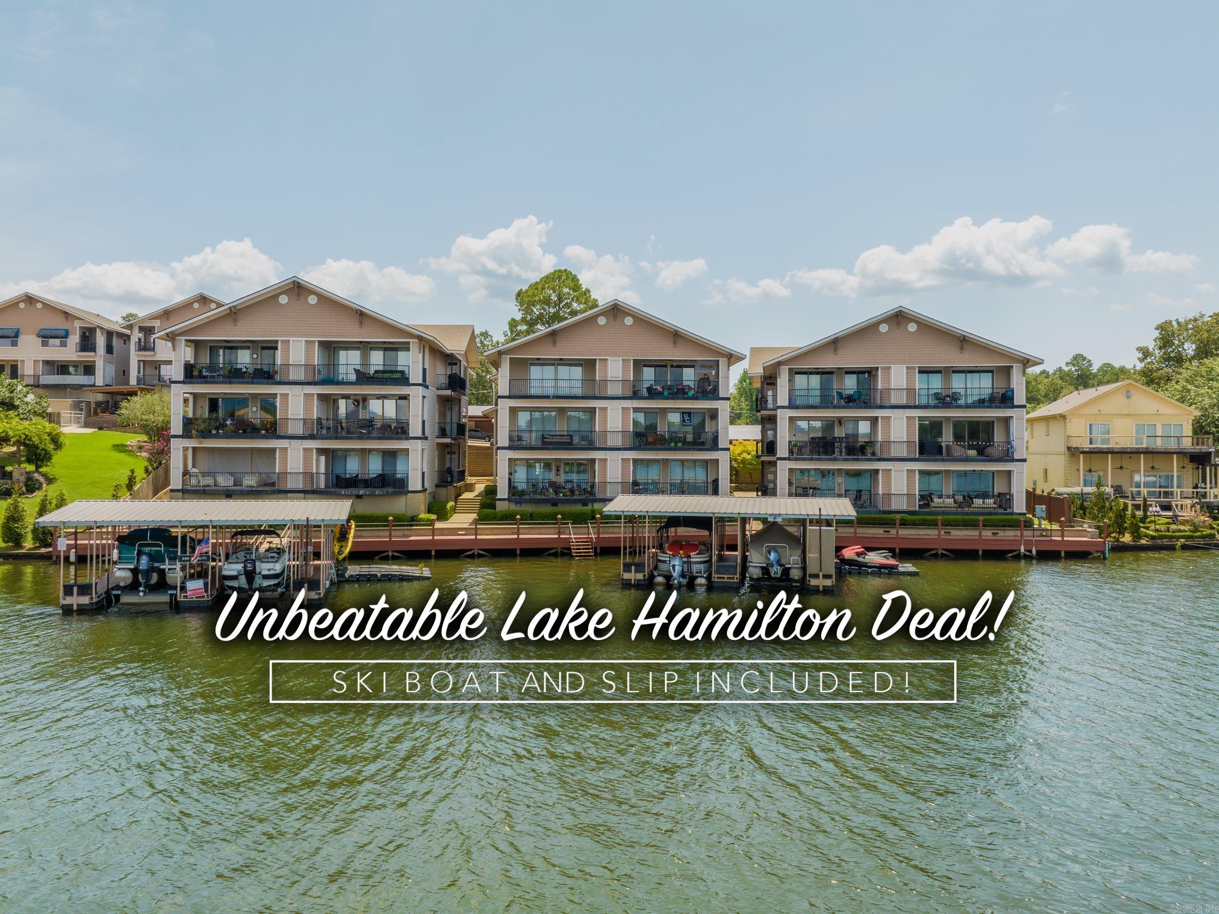 Unbeatable deal on Lake Hamilton ā Boat AND Slip Included! This is the best deal currently available on a condo at Lake Hamiltonādonāt miss your opportunity to own in the prestigious, gated Bel Lago community. Enjoy luxury lakefront living in a private, beautifully landscaped, and secure setting overlooking the shimmering waters of Lake Hamilton. This condo features steel construction, an oversized garage, a separate workshop, AND an interior elevator for convenience across all levels. The main floor showcases a spacious living area, dining space, and a gourmet kitchen complete with granite countertops, stainless appliances, a breakfast bar, and panoramic lake views. Double sliding doors lead to a curved balconyāideal for relaxing or entertaining while taking in the view. You'll find two generously sized bedrooms, each with en-suite bathrooms and walk-in closets. The primary suite features its own private terrace with stunning lake views and a full laundry room just steps away. As a resident, you'll enjoy access to the community poolāand best of all, a covered boat slip (And Boat!) is included. Act fastāopportunities like this don't last!