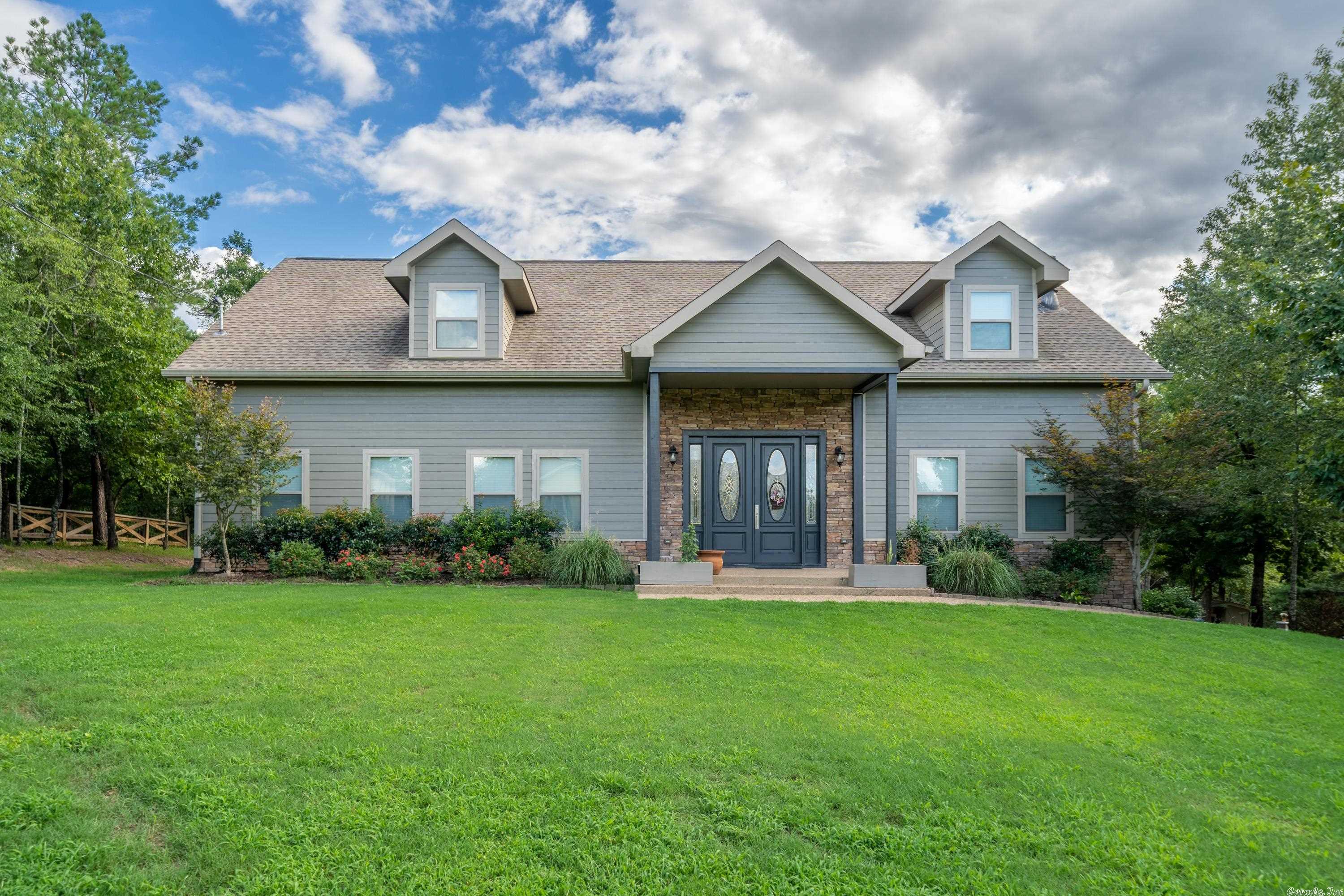 Absolutely Beautiful Custom-built home!!! Everything you need! Private 3 acres! This home is built to last! Top quality! It would be perfect for the large family. Designer paint colors, master has a massive tile shower, heated tile floors downstairs! Custom fireplace, nice built-ins, Gameroom with 12 ft ceilings, highly energy efficient, insulated 6in walls, windows, 2 HVAC units, mechanical room, walk-in closets, greenhouse with plants, nice landscape, sprinkler system, stereo surround, grilling deck.