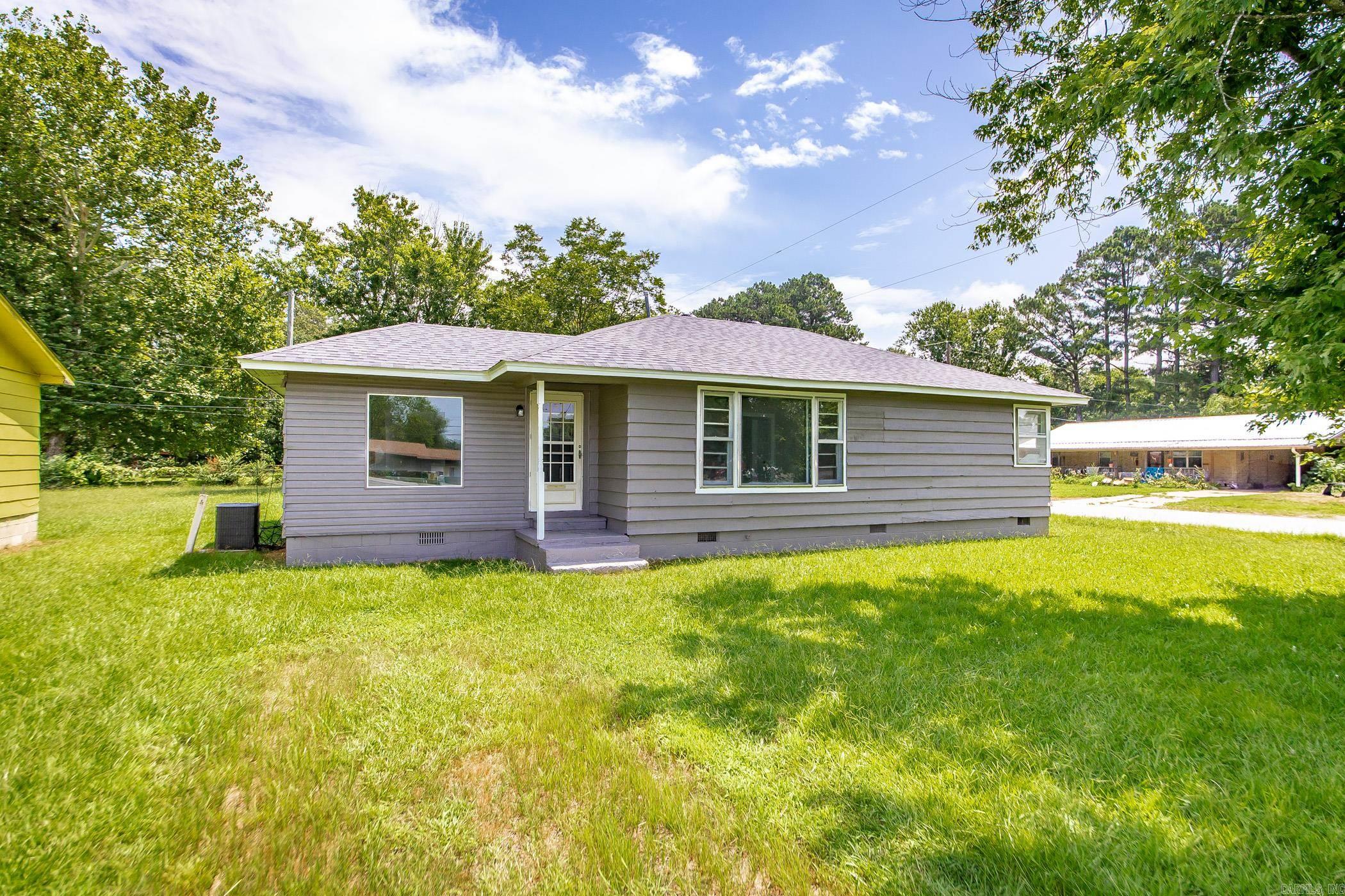 Charming remodeled home with a spacious yard!! Featuring a NEW ROOF, fresh paint, new floors, new light fixtures, new plumbing fixtures, new granite countertops, and much more all in an IDEAL location. Nestled in a peaceful setting just minutes from Searcy, it truly is the best of both worlds close to everything you need. Perfectly sized for a small family, this home features thoughtful updates throughout, cozy living spaces, and a functional layout that feels just right. Step outside to enjoy a large, open yard -- ideal for kids, pets, gardening, or simply soaking up the fresh air. Whether you're looking for your first home, a downsized retreat, or a place to plant roots, this property checks all the boxes. Great location, generous outdoor space, and a move-in ready home -- it's all here waiting for you!