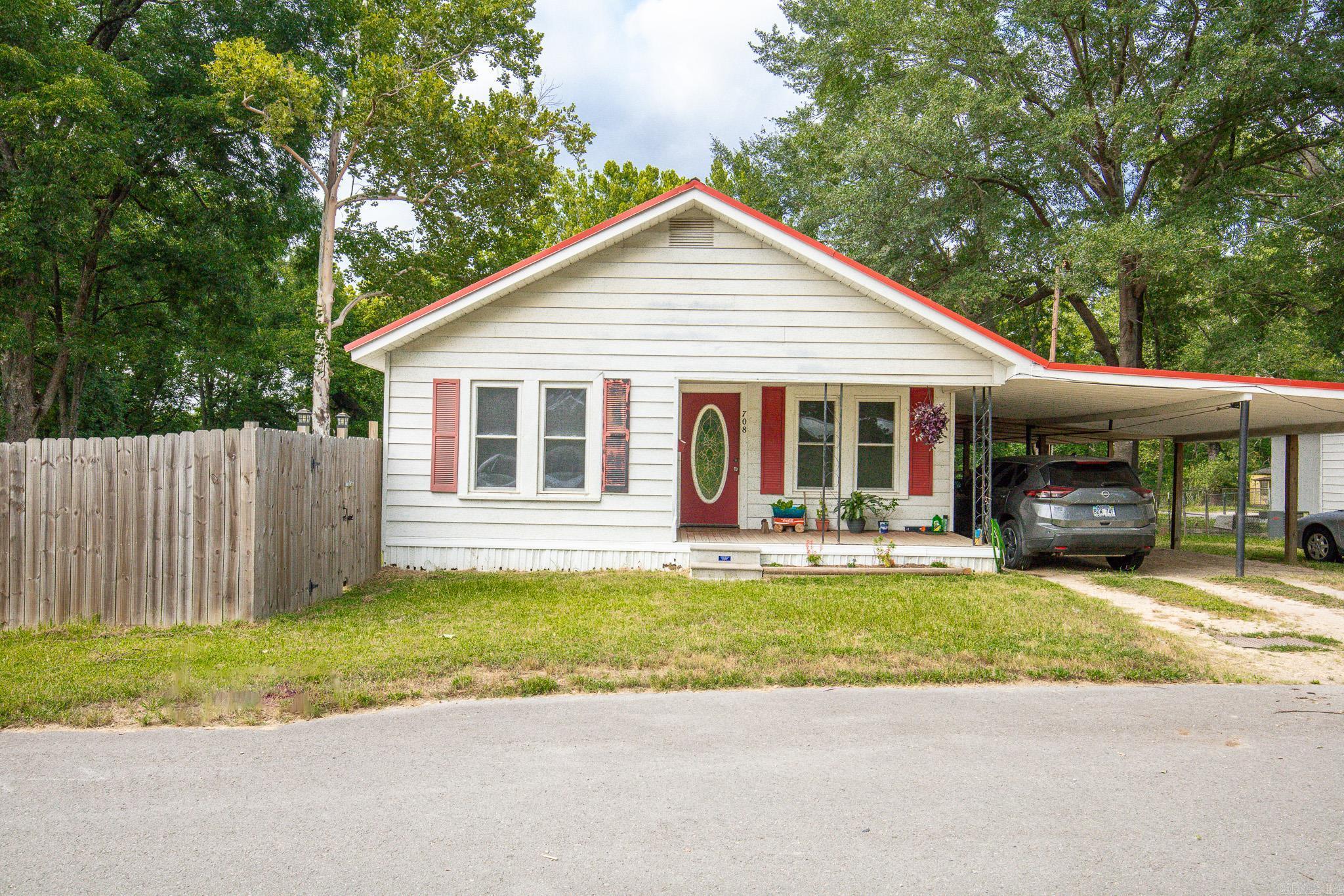 Large 4 bedroom 2 bath home (Jack & Jill style) with a gas fireplace in the living room, spacious eat in kitchen & huge Primary suite. The backyard is fully privacy fenced and there is a nice covered back deck for relaxing and enjoying evenings outside. New stainless appliances (gas stove) & fresh paint in last few years. Home also has a metal roof....Affordable price at $189,900 for 1762 sq ft & 4 bedrooms!