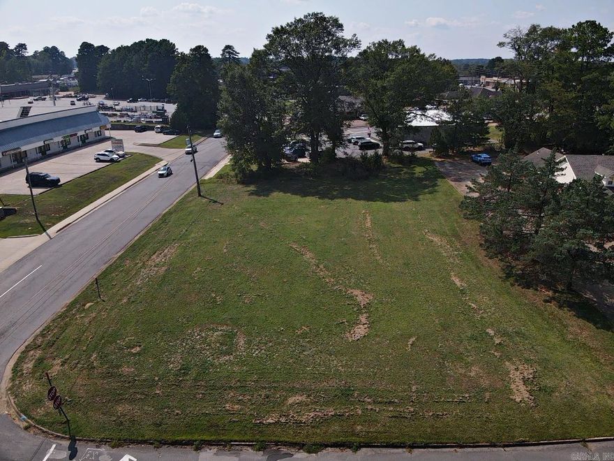 Highly visible commercial lot with street frontage on Caddo and 26th Streets. Nice corner lot with 6,700 daily traffic count. Utilities easily available. Bring your commercial plans and call today!