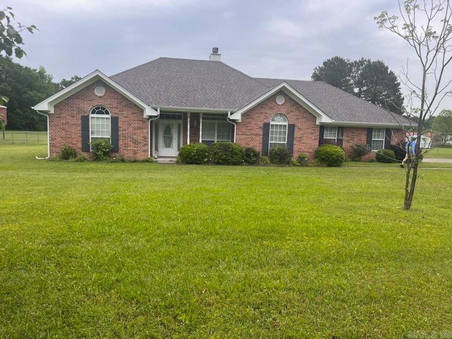 This amazing 3 bed 2 bath home sits on 1.08 beautifully groomed, completely fenced acers just outside city limits. All flooring is currently being replaced with durable and appealing vinyl plank! This home features cathedral ceilings in 2 of the bedrooms and paned ceiling in the living room, a walk in bath tub in the hall and walk in shower in the master, a gas fire place, exterior storm doors, 2 car garage with safe room, 2 12x12 storage buildings and the fridge will stay!!! The roof was replaced in 2023 on the home and both storage buildings and the propane tank is owned and will convey with the home. Make your appointment to see this amazing home today before it's gone!!