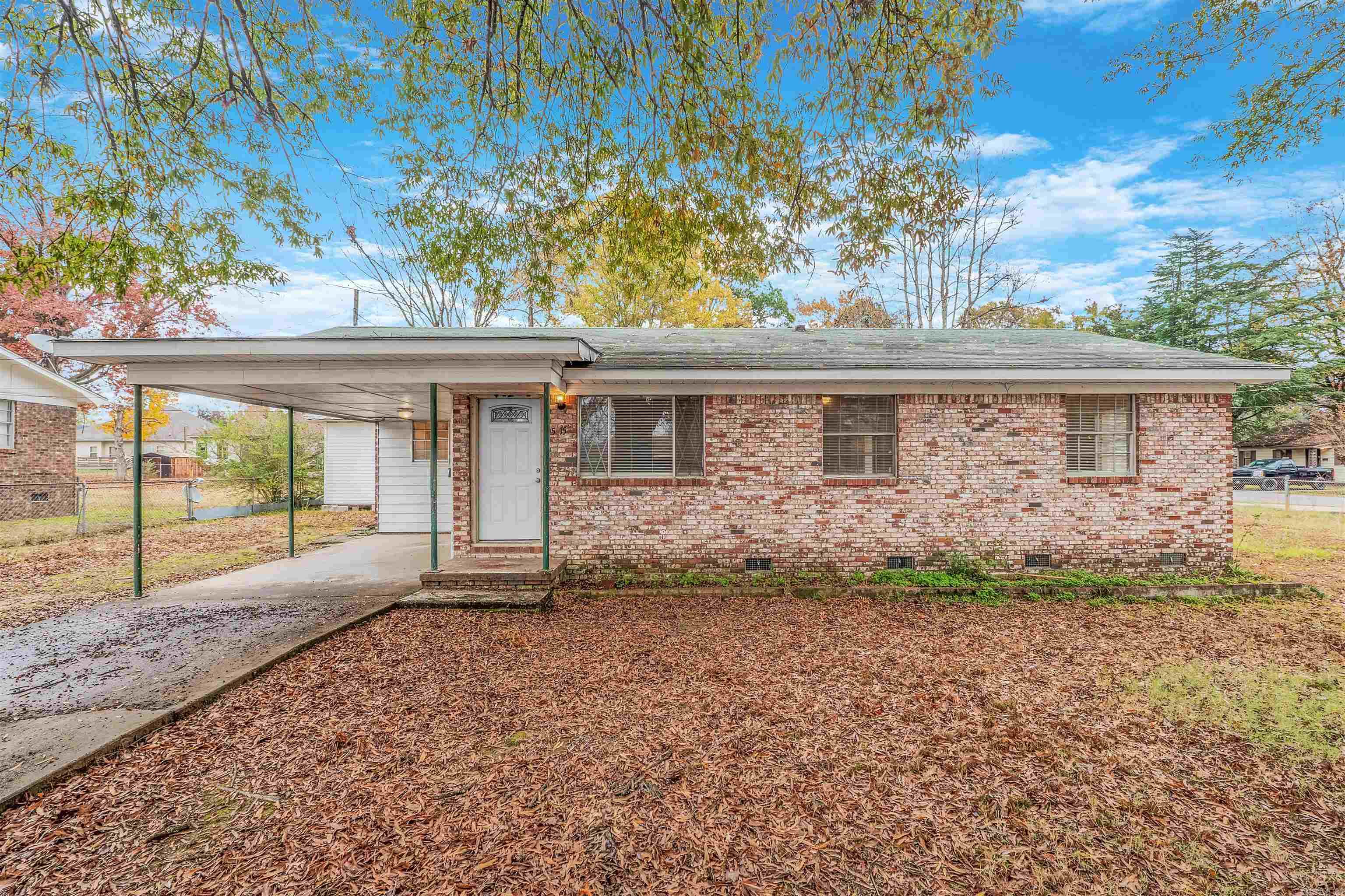 Taxes include homestead credit.  Cozy one level home on quiet street. Close to shopping, UALR & easy access to highway and bus line.  This 3 bedroom, 1-1/2 bath home offers a large storage building in back.  There's also a storage room attached to the house.  Approximate 200 sf room add on not included in square footage makes a nice sized second living area.  Wood floors in bedrooms.  New sink in master bath and shower in hall bath. Some new light fixtures. The yard is large and completely fenced.