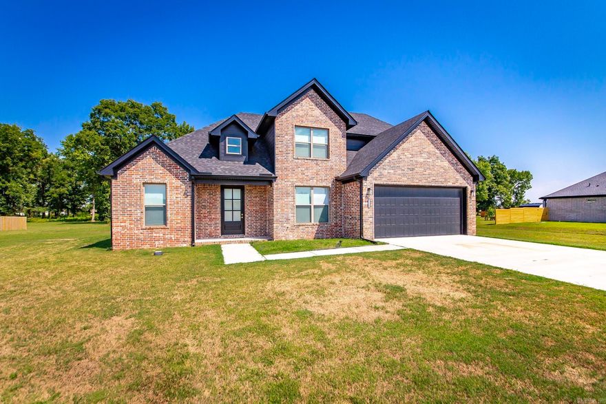 Stunning home in the fabulous Ashley Downs Subdivision.  Welcome home to this beautiful property built in 2023. Nestled on a spacious 1.25 acre lot, this meticulously designed home offers modern living at its finest. This residence features three generous bedrooms and 2.5 baths. The main level boasts a luxurious primary bedroom, providing ultimate convenience & privacy, while two additional bedrooms are located upstairs. Step inside to discover an inviting gas fireplace. The well appointed eat-in kitchen is a chef's dream, featuring a gas stove, walk-in pantry and ample counter space for meal prep. Enjoy year-round comfort with a mini-split system upstairs, and electric blinds throughout. Luxury vinyl flooring and plush carpet flow seamlessly throughout, combining style with practicality. Step outside to relax on the covered patio, ideal for outdoor entertaining or enjoy quiet moments in nature. The expansive yard offers plenty of room for activities, gardening, or simply soaking up the sun. Don't miss your chance to own this exceptional home in a vibrant community. Schedule your viewing today! See agent remarks