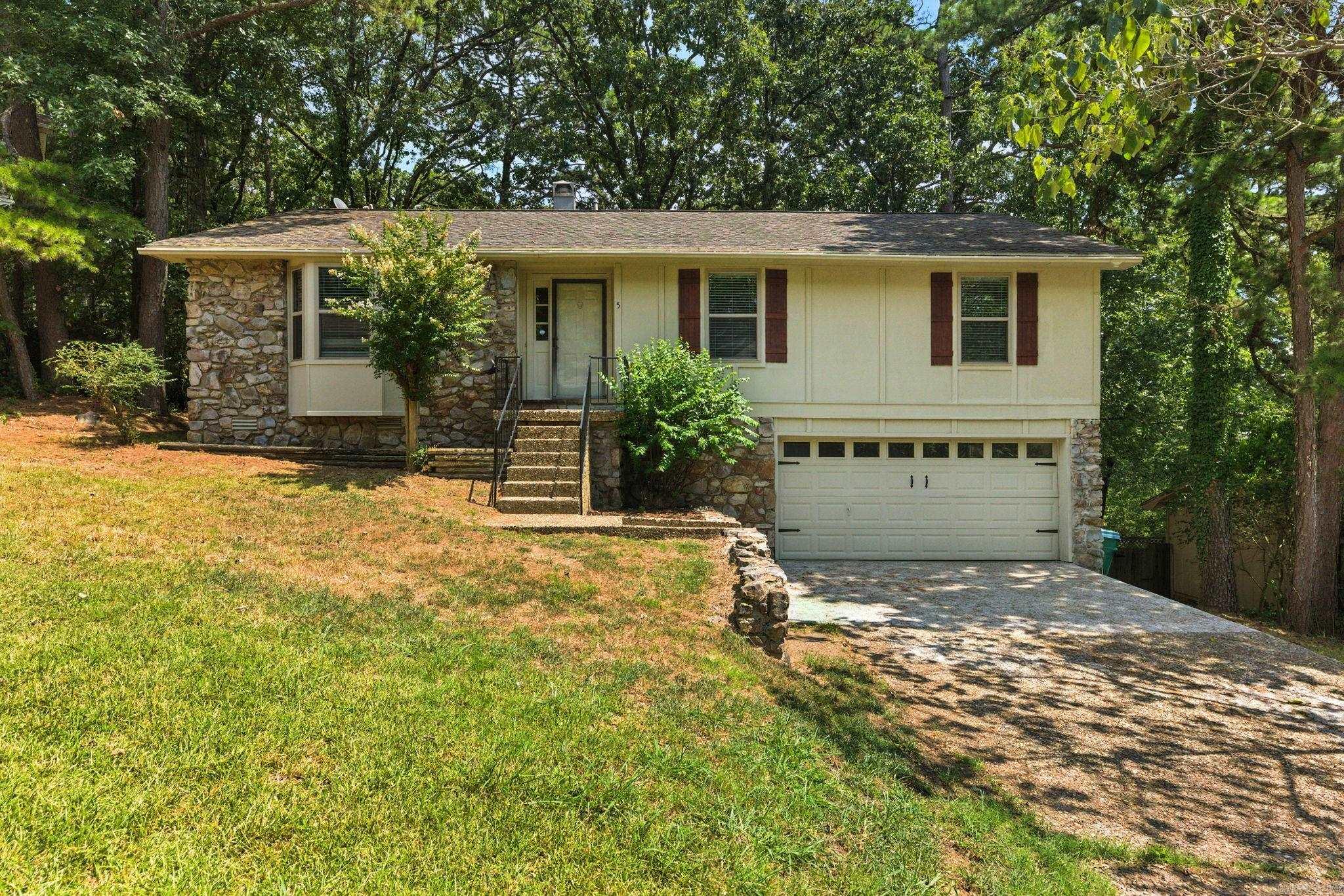 Hot Listing in West Little Rock ā Donāt Miss Out! This beautifully renovated 3-bedroom, 2-bath gem in Pleasant Valley is move-in ready and PACKED with upgrades at an unbeatable price! Nestled in the top-rated Don Roberts Elementary zone, and located just minutes from WLR ameneties like shopping, dining, and quick interstate access, this home offers the perfect blend of style, space, and convenience. Step inside to discover modern eleganceāfrom the brand new energy-efficient vinyl windows to the premium 20 mil wear-layer vinyl plank flooring that flows throughout. Freshly painted walls, granite countertops, and large crown molding add a touch of luxury to every corner. The oversized den with a cozy gas log fireplace opens seamlessly to the kitchen, dining area, and barāideal for entertaining or family gatherings. Step outside to a spacious, oversized deck and enjoy a fully fenced backyardāperfect for pets, play, or your next BBQ. Storage is no issue here! The oversized 677 sq ft two-car garage includes plenty of room for storage and even has a dedicated workshop area. This one wonāt last longāschedule your showing today before itās gone!