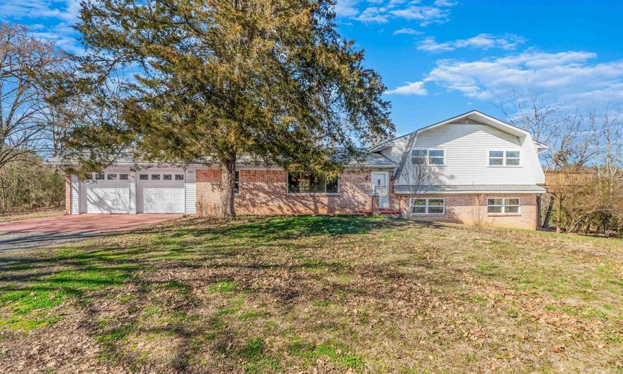 Welcome to your dream home: a spacious 4-bedroom sanctuary, complete with an office (which could be a walk-in pantry) and two sprawling living spaces. Nestled away from the hustle and bustle, this home offers tranquility with beautiful views & a lush yard that includes a couple fruit trees. As you step inside, natural light dances through generous windows. Each bedroom exudes comfort and serenity, offering peaceful slumbers and rejuvenating mornings. The outdoor space becomes your personal oasis, where the melody of the birdsong harmonizes with the rustle of the leaves. Enjoy the covered back patio or the beautiful deck from upstairs. Whether you're unwinding in one of the living spaces or finding inspiration in the office, every corner of this home invites you to create cherished memories and embrace the beauty of country living. Home just recently had new LVP flooring, new cabinets, new kitchen countertops and tile backsplash, new kitchen sink, new appliances, New windows/screens, New electrical box, meter service, and outlets. Bring the lake toys as this home is located less than 15 minutes from the beautiful Greers Ferry Lake!