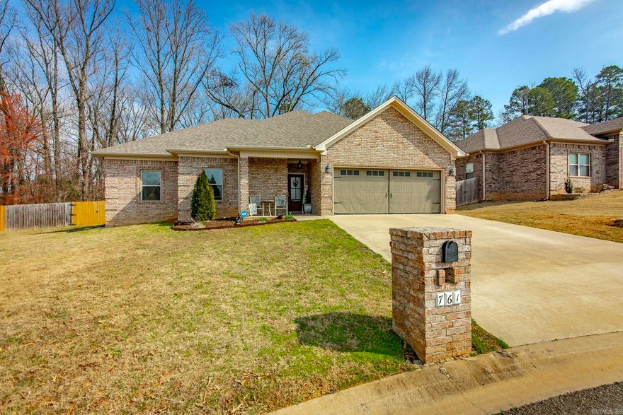 Welcome home to this beautifully maintained 4-bedroom, 2-bath property that truly checks all the boxes! Nestled on a lot that backs up to peaceful woods, you’ll love the added privacy and serene views from the fully fenced backyard — perfect for relaxing evenings or weekend gatherings.  Inside, the open and split floor plan offers the ideal layout for both everyday living and entertaining. The spacious living area features a cozy gas fireplace and flows seamlessly into the kitchen, where you’ll find granite countertops, stainless steel appliances, and plenty of space to cook and gather.  The private primary suite is a true retreat with generous space and a well-appointed bath designed for comfort. Three additional bedrooms provide flexibility for guests, a home office, or playroom.  Meticulously cared for and move-in ready, this home shines with pride of ownership throughout. Don’t miss your chance to enjoy comfort, style, and privacy all in one!