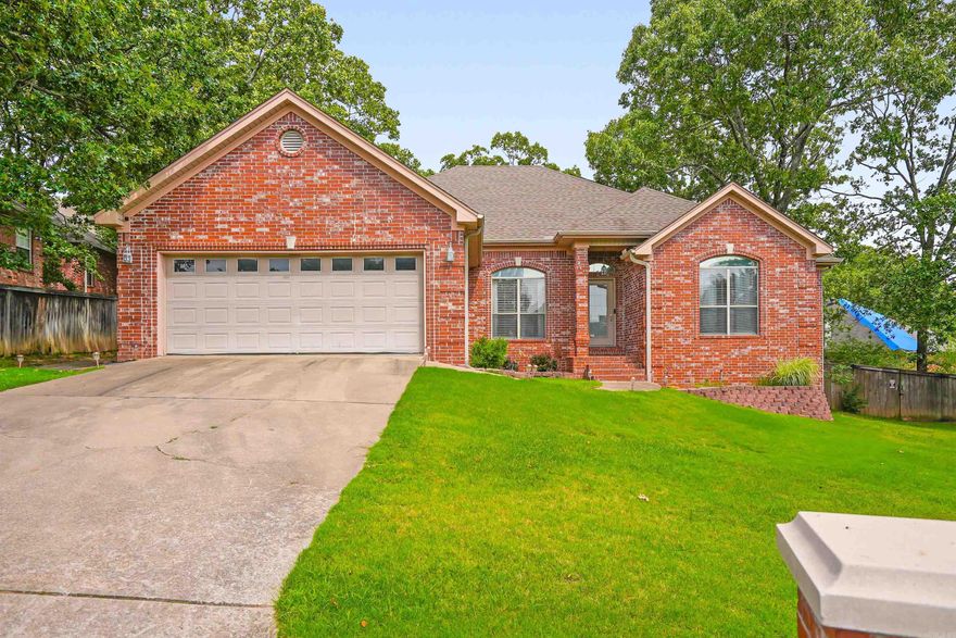 Come take a look at this beautiful home in Gap Creek! Situated on a quiet cul-de-sac, this home offers four bedrooms, two and a half bathrooms and 2227 sq ft of living space. The large living room has a cozy wood burning fireplace for those chilly Arkansas winters. Living and dining rooms flow perfectly into the kitchen and eat-in area making it perfect for family get togethers and holiday gatherings. Plenty of cabinets in the kitchen for all of your storage needs along with a pantry. Brand new flooring throughout the home in 2024, no carpet! The large kitchen has stainless steel appliances, pantry and a refrigerator that conveys. Step out back to your relaxing deck with a hot tub and large, fully fenced backyard with french drains installed in 2024. Front and backyard have sprinkler system. Schedule your showing and come take a look for yourself!