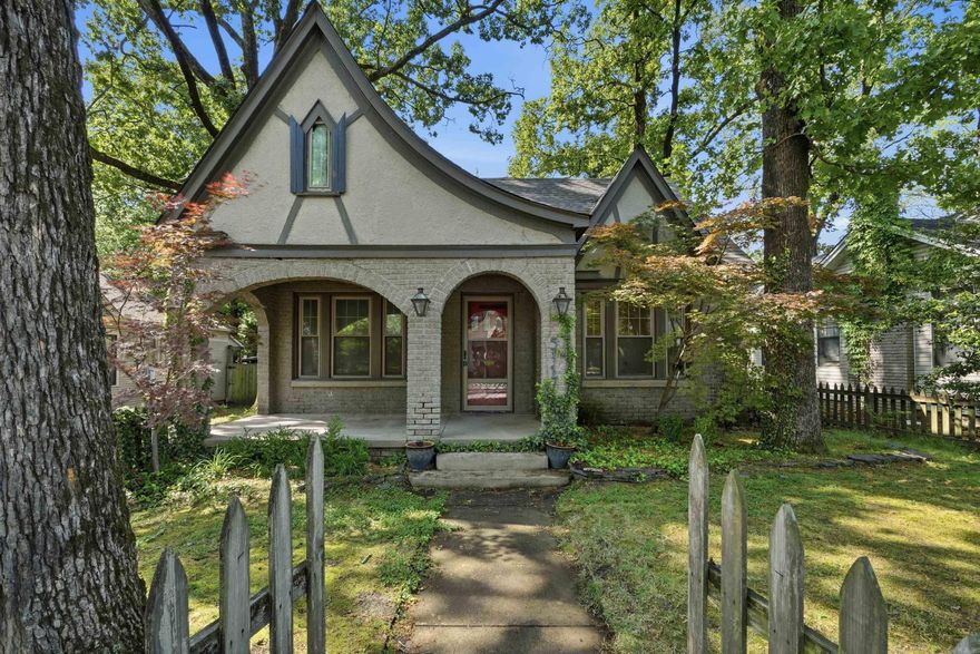 Some mornings, you just know you're exactly where you're supposed to be. That's the feeling 5117 Cantrell Road delivers — a 1930 Tudor-inspired craftsman bungalow sitting quietly in one of Little Rock's most irreplaceable neighborhoods. The lower level welcomes you with real hardwoods and the kind of character that took a century to earn. The back of the home opens into a flexible living space that flows naturally onto a large deck and patio — where the hot tub stays, the conversation lingers, and Tuesday evenings feel like weekends. Upstairs, the fully remodeled second level functions as a suite, where updated comfort meets original soul. New roof in 2026. Forest Park Elementary is a walk away. You’re just a short walk from both Hillcrest and The Heights—where local restaurants, charming shops, cozy coffee spots, and neighbors who quickly become friends all come together. This is the rare home where historic charm isn't a selling point — it's a lived experience. The hardwoods, the architecture, the century of story embedded in every room — it's all still here, waiting for whoever comes next.