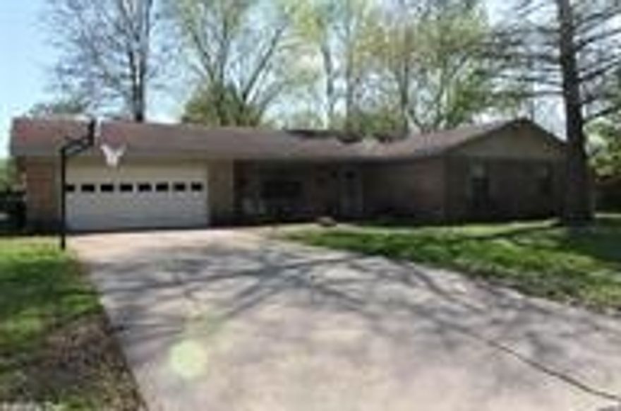 Spacious brick home w nice fence yard and storage bld, open floor plan with fireplace, huge laundry, L shaped kitchen, wonderful sunroom, custom paint colors, home has had some nice updating.  MOtivated seller and price.