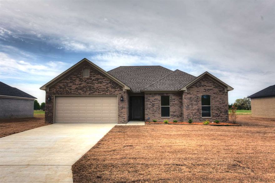 New Construction by Jacob Longing in McKenna cove Subdivision.  3 bedroom 2 bath.  All brick home with concrete floors, open floor plan, split bedrooms.  2 car garage with over 1400 sq.ft.