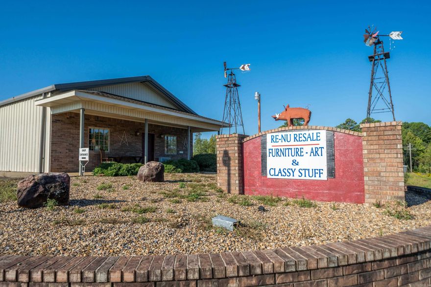 This prime commercial property offers exceptional visibility and high traffic counts, making it ideal for a variety of businesses. Situated on over 1 acre on Highway 7 North and featuring over 100 feet of highway frontage, you'll love the location and potential for expansion; and the recent completion of the new bypass nearby offers even greater convenience and accessibility. Scenic Highway 7 North is the main artery that runs from Hot Springs to Hot Springs Village, and the beautiful route to Northwest Arkansas. Whether you're looking to open a retail business, restaurant, office, or medical facility, this is a wonderful opportunity to own a prime piece of commercial real estate. (Current Business and inventory is negotiable. Sellers will consider selling the adjoining 1-acre parcel separately).