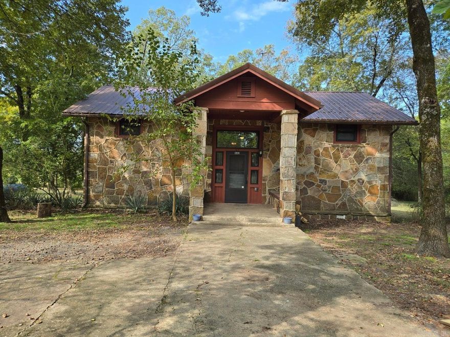 ONLY 3 MILES FROM CHEROKEE REC AREA ON GREERS FERRY LAKE. Own a piece of History with this 1937 Brownsville School house that was used until around 1953 on approx 1.5 acres. But still enjoy the modern conveniences with CHA, back-up gas stove, fresh paint and light fixtures and fans, new flooring, gas stove approx 2 years old (plugged for electric if desired), a wonderful new back deck approx 10X26, Metal roofing from 2023, new gas water heater, updated wiring and breaker box a detached garage with new break box as well.