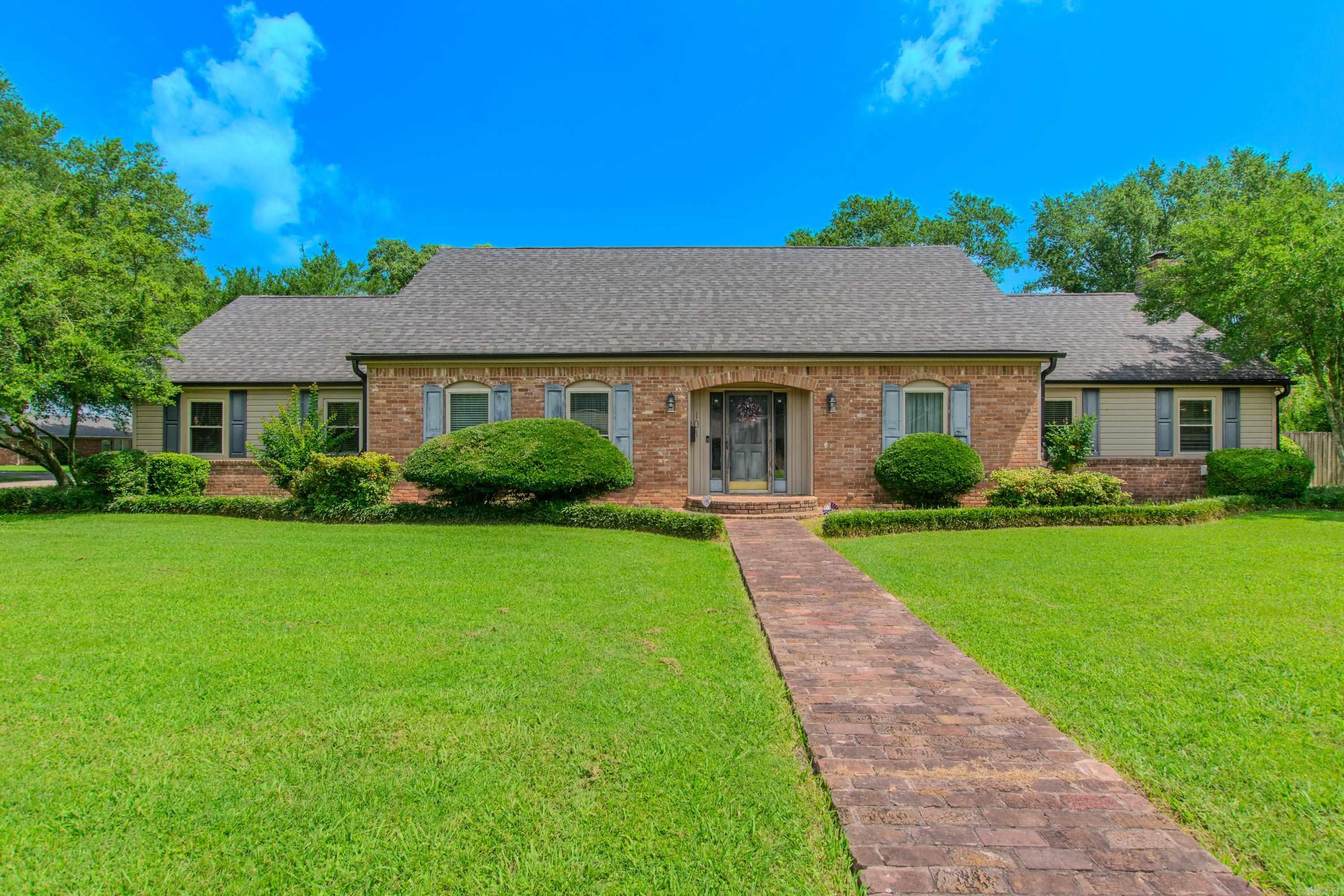 This 4 Bedroom 3 full bath, with half bath, plus an office, is a move in ready gem. Sitting on almost half an acre corner lot, this home is all the best in both indoor/outdoor appeal. Generously sized rooms with plenty of space to spread out. Majority of living space is on main level with only 2 Bedrooms and 1 full Bath upstairs. The oversized dining room can accommodate a full size table for large gatherings, in addition to the living room, with wood-burning fireplace, allowing for plenty of seating furniture. Kitchen features granite counters, coffee bar area, breakfast bar, separate breakfast-nook with cabinet built-ins. Vinyl windows. Massive primary bedroom has 5 closets, an additional en-suite flex space room for a nursery, exercise room, a home-office, or your own personal living room. Primary bathroom has separate vanities and a large soaker tub. Enjoy warm Arkansas days in your private in-ground swimming pool, fully privacy fenced backyard, outside storage area, large back patio for lots of outdoor lounging in the sun. Architectural shingle roof, fascia, gutters-2024. Pool Pump-2023, robot pool cleaner-2024. $5,000 in Buyer concessions offered. See Agent Remarks please.