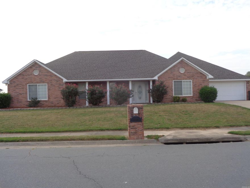 Spacious 5 bedroom, 3 full bath house with approx. 3000 sf on almost a half acre lot. Open floor plan to a large family room area. A Man's Cave off the family room or a private guest bedroom. A new roof installed in 2020. New heating and cooling system installed in 2020.  Six (6) new windows installed in 2021. New flooring installed in the Fall of 2022. Home is all electric. Refrigerator is to convey. Agents please check remarks section.