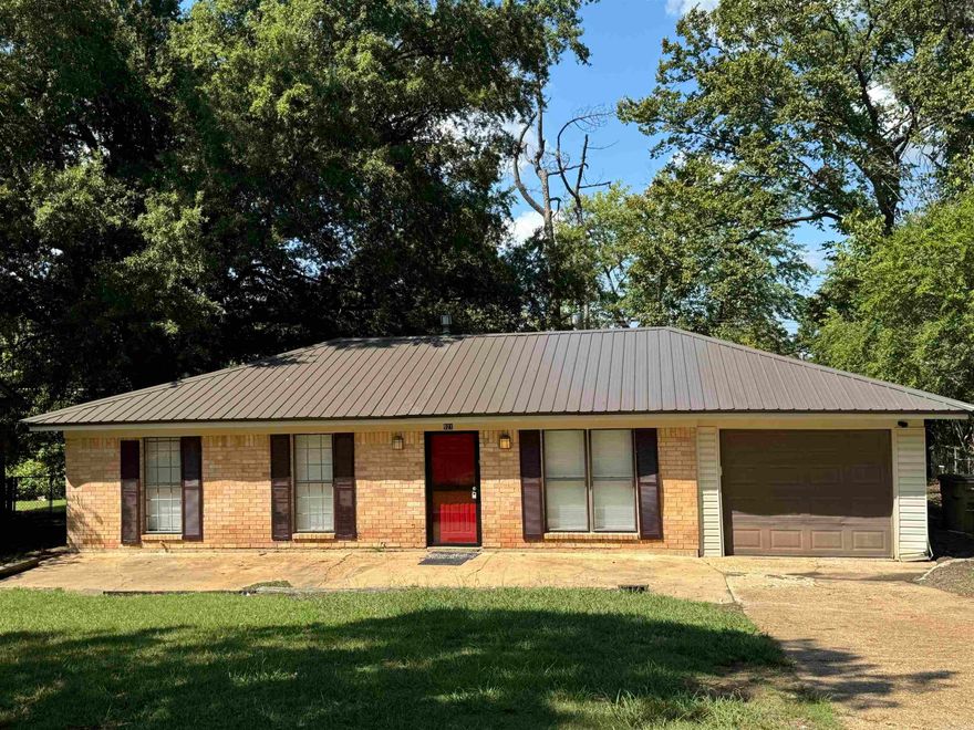 Back on the market! New metal roof . Great starter home!  This 3 bedroom 1 bath home has been freshly painted and is waiting for its new owner!  The back yard is fenced in and great place to relax ! Agent owned