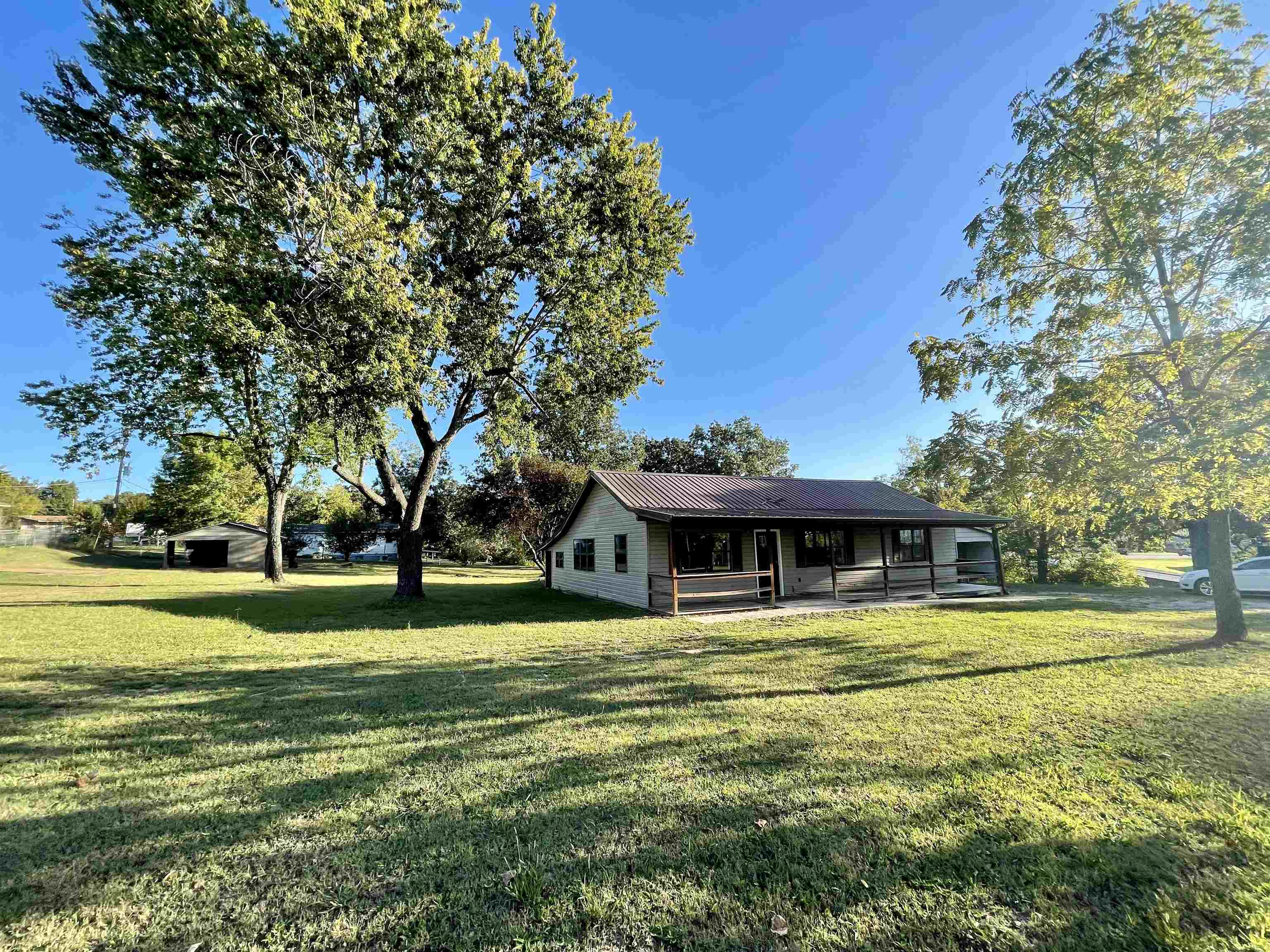 Welcome to the market this 3-4 bedroom 1.5 bath home in Salem Ar! 659 West Church Street. All electric with heat pump. NEXT internet for high speed availability. Updated flooring in kitchen and living room. Huge laundry room, all electric, spacious kitchen with solid wood cabinetry and a pantry. Almost an acre of land with mature oak trees giving for nice shade, city water and sewer, and metal roof. Call today to set up an appointment. Great location only minutes to town square and a short drive to Mountain Home, AR