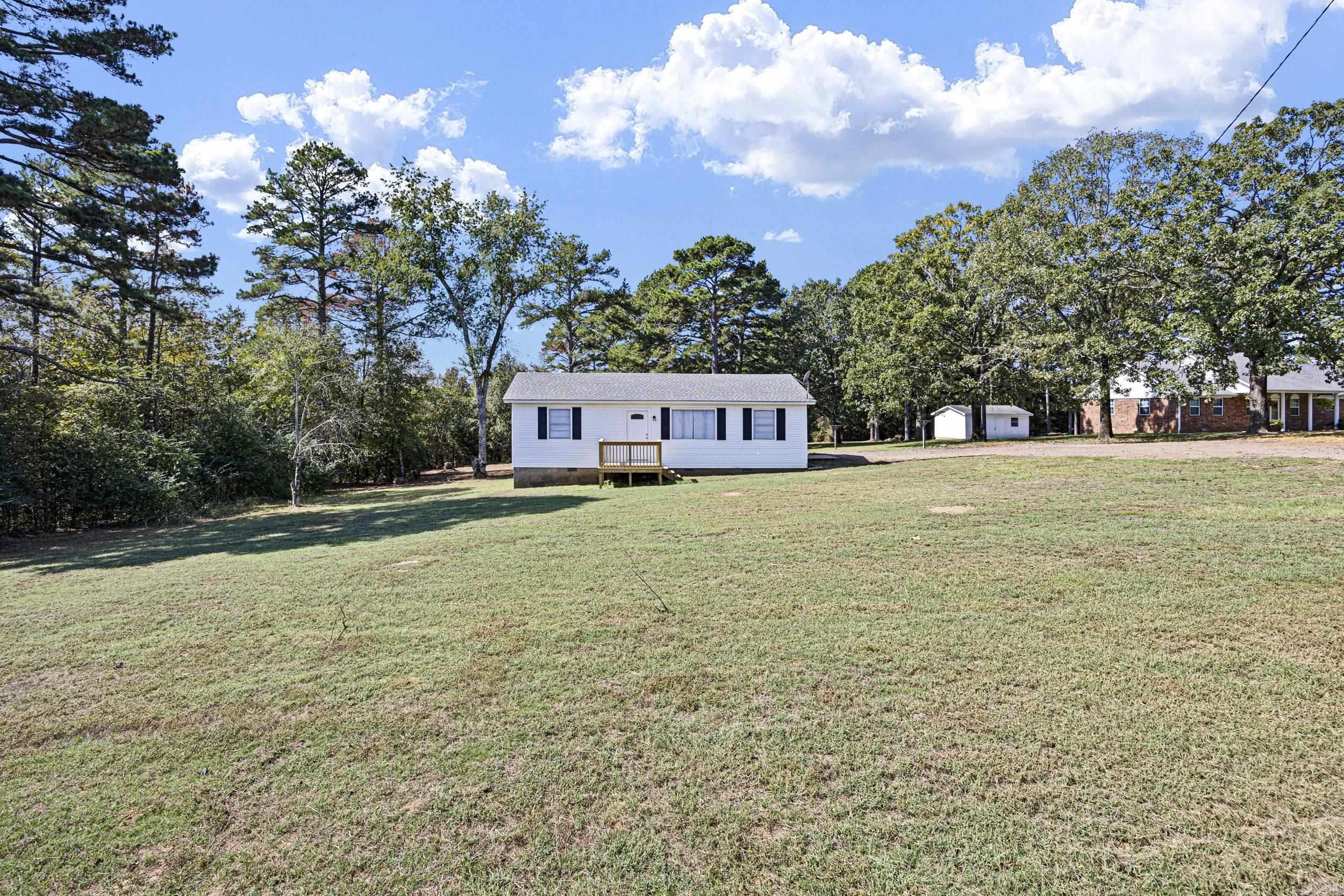 Welcome to this adorable 3-bed, 1-bath home, tucked away for peaceful living while still being minutes from the main road for easy access. This home has been completely renovated from top to bottom, offering the perfect blend of modern updates and cozy country charm. Step inside to find brand-new flooring throughout, including plush carpet and luxury vinyl plank wood for a warm, inviting feel. Fresh paint and new flush ceiling lights brighten every room, creating a clean and welcoming atmosphere. The quaint kitchen is a true highlight ā featuring new appliances, butcher block countertops, and charming touches that make it feel like home the moment you walk in. Enjoy a large yard surrounded by mature trees, offering privacy and plenty of space for outdoor living, gardening, or entertaining. This move-in ready home has everything you need. Donāt miss your chance to own this cozy countryside retreat!