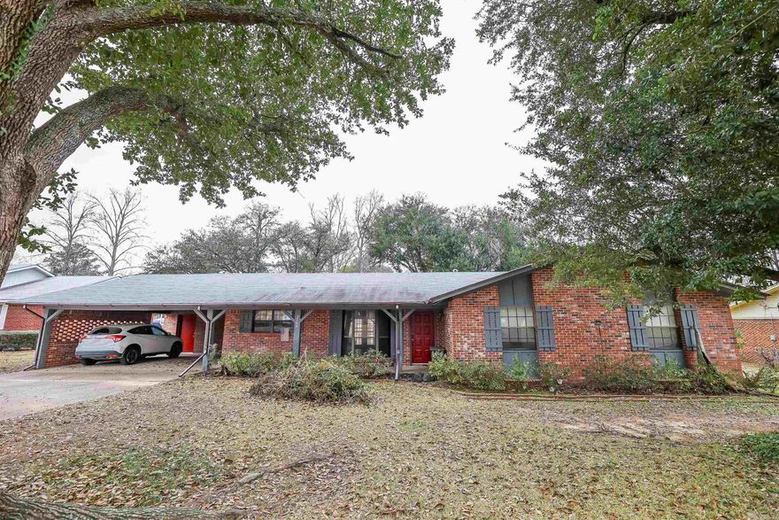 Charming brick home in an established neighborhood. Enjoy cozy nights by the wood-burning fireplace, and enjoy the airy flow from the living room to the dining area and kitchen. Lovely covered back patio, spacious laundry/utility room, and new carpets and bathroom flooring are just some of the additional features you will love about this Cherokee Addition property.