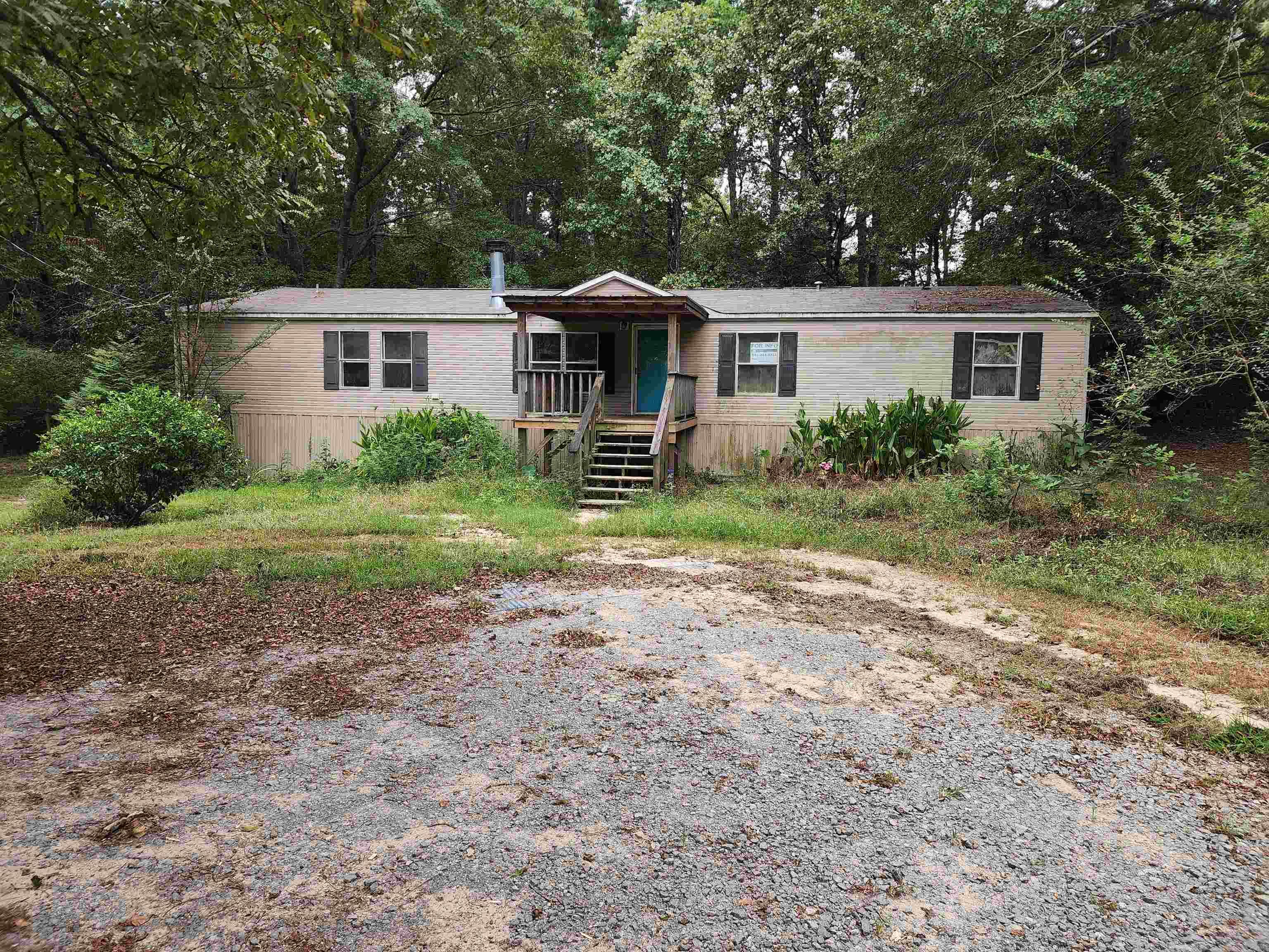 2007 Mobile Home situated on approximately 0.42 Acres.