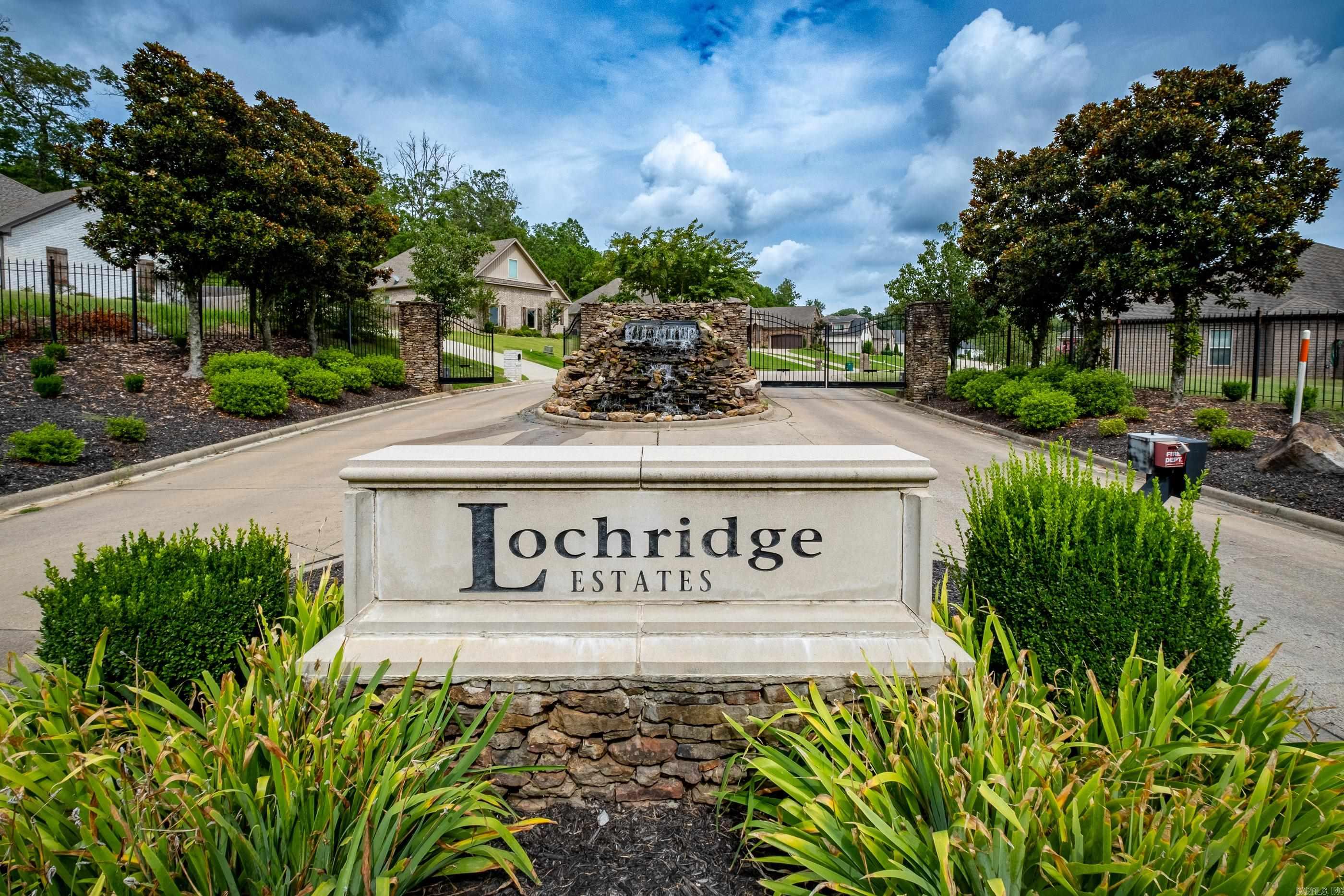 Over a third of an acre cleared lot in the Lochridge Estates gated community with private lake. Lot faces NE which will provide beautiful sunset views from the deck. The lot has been clear and is ready to build.