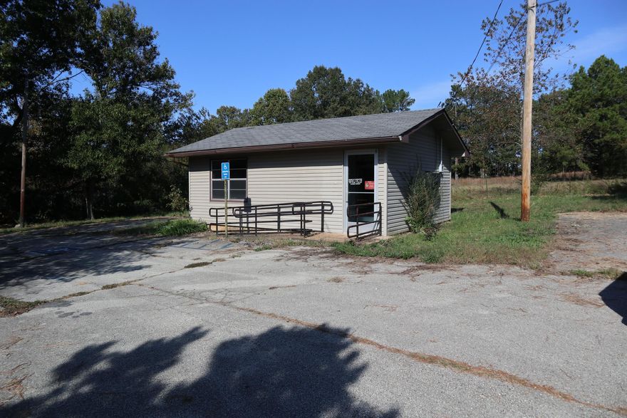COMMERCIAL PROPERTY WITH HWY FRONTAGE CAMP ARKANSAS  Property located on Hwy. 9 N, Camp, AR. This small commercial building has 432 sq ft of area. It has a wall air conditioner and gas heater. Also includes well and septic system. Great location with highway frontage and high traffic area. The building could also be used for a cabin. It has approx. 5.5 acres that has potential for further development and house sites.