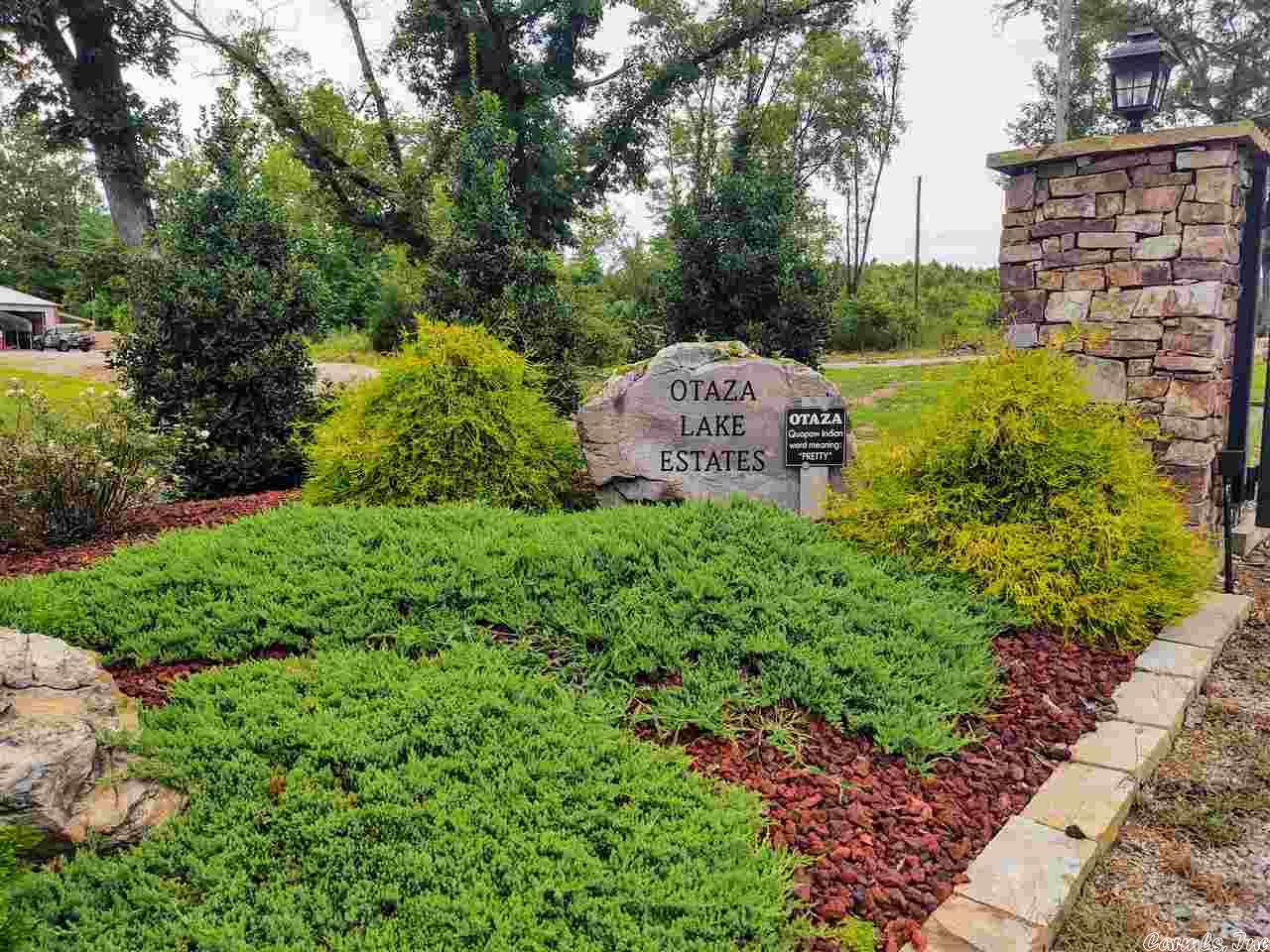 3 acre tract with gated access in Fountain Lake area. This property has approximately 2 acres across from the lake and 1 acre on the lake. Perfect for a gazebo. Beautiful views! Minimum of 1800 sqft. County water and electric are at the street but not brought onto the property. Septic system will be required. Access to private lake.