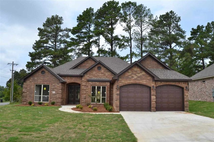 GREAT FLOOR PLAN!! AMENITIES INCLUDE APPROX 2000 SF, 4BR/2BA, SPLIT BEDROOM FLOORPLAN, FORMAL DINING ROOM, GREATROOM W/WOOD BURNING FIREPLACE, LAUNDRY ROOM, HUGE ISLAND IN KITCHEN, GRANITE COUNTERTOPS THROUGHOUT, HARDWOODS, TILE IN ALL WET AREAS, OUTDOOR COVERED BACK PATIO, CROWN EVERYWHERE, LARGE MASTER BATH W/JETTED TUB, SEPARATE SHOWER & WALK-IN CLOSET, BRYANT SCHOOLS & MUCH MORE!!!  Please measure to determine square footage accuracy.