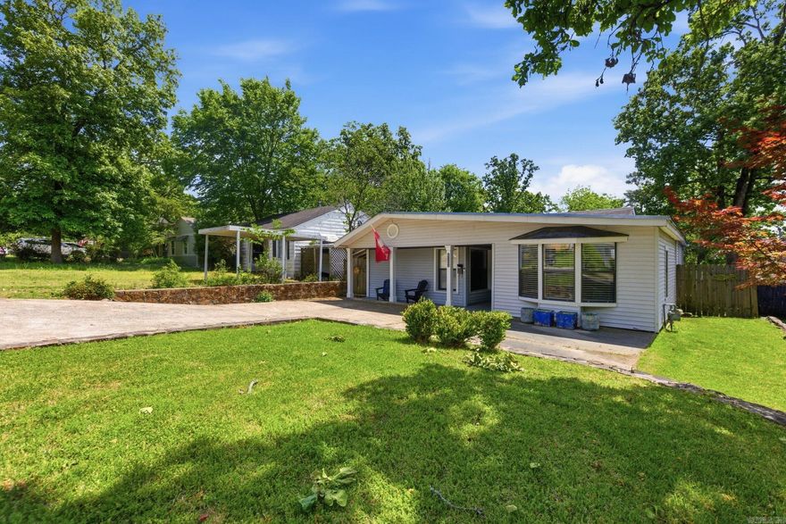 Rare find in Cammack Village! This beautifully updated 4-bedroom, 3 full bath home offers over 1,700 square feet of well-designed living space in one of Little Rock’s most sought-after pockets—just one block from Baker Park and Jefferson Elementary.  Inside, you’ll find stone countertops, updated appliances, a spacious layout, and a stylish walk-in shower that elevates the everyday. Designed for both comfort and entertaining, the home features an inviting electric fireplace and a seamless flow to the covered patio overlooking a large backyard.  The standout outdoor space includes a permanent stone fire pit—perfect for gatherings year-round. Freshly painted and move-in ready, with a newer stainless refrigerator that conveys, this home checks all the boxes for easy living.  Opportunities like this in Cammack Village don’t come around often—schedule your showing today!