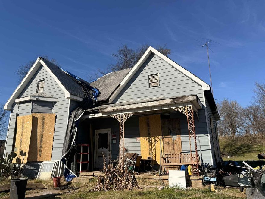 2 bedroom, 1 bath home offering a great opportunity for investors or buyers seeking a renovation project. Property is in need of extensive repairs and updates throughout. Sold as-is. Owner financing available with acceptable down payment and terms. Ideal for rehab, rental, or value-add investment.  Property conveyed with a limited warranty deed.  AGENTS SEE REMARKS