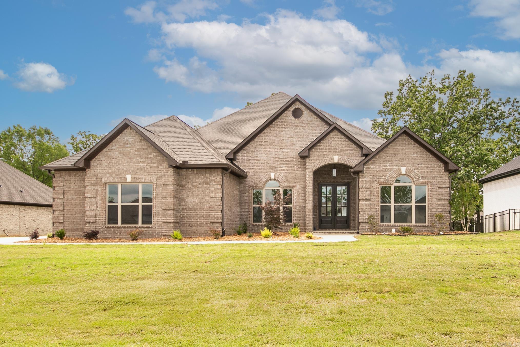 This brand-new 4-bedroom, 3-bathroom home, has everything you’re looking for! The split floor plan offers a great flow, with a formal dining room and a cozy living room featuring a gas fireplace. The kitchen is a dream, with plenty of cabinet storage, a gas range top, tiled backsplash, granite countertops, a breakfast bar, and a casual eat-in space. There’s even a hearth room for that extra touch of coziness. The spacious primary bedroom features a tray ceiling, double vanities, a tiled walk-in shower, a stand-alone tub, and a massive walk-in closet. You’ll also love the large laundry room with extra storage, the big back porch for outdoor entertaining, and the 3-car garage. This home combines style, comfort, and functionality—everything you need in a perfect living space!